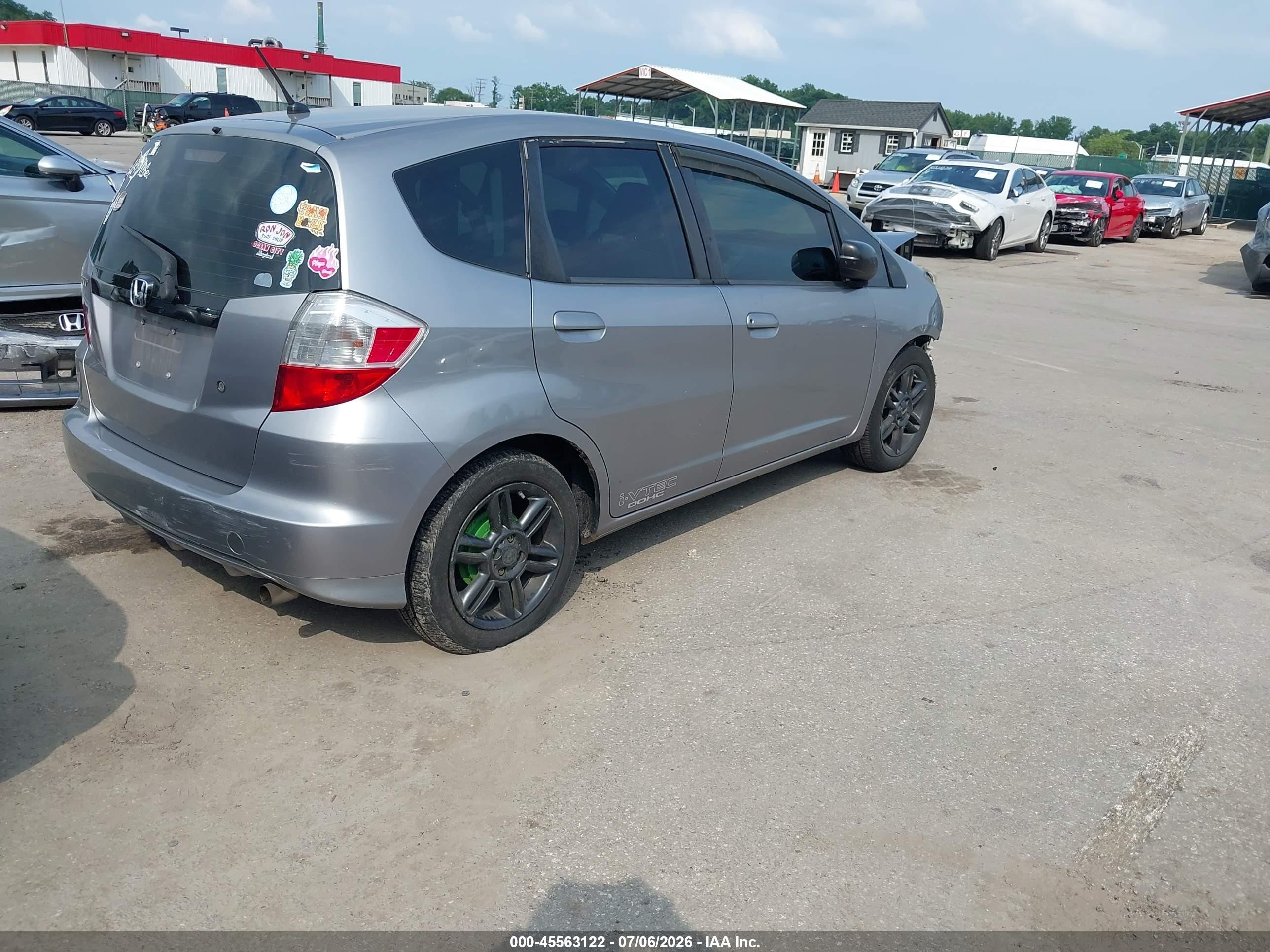 2009 Honda Fit   Gray vin: JHMGE88289S057583