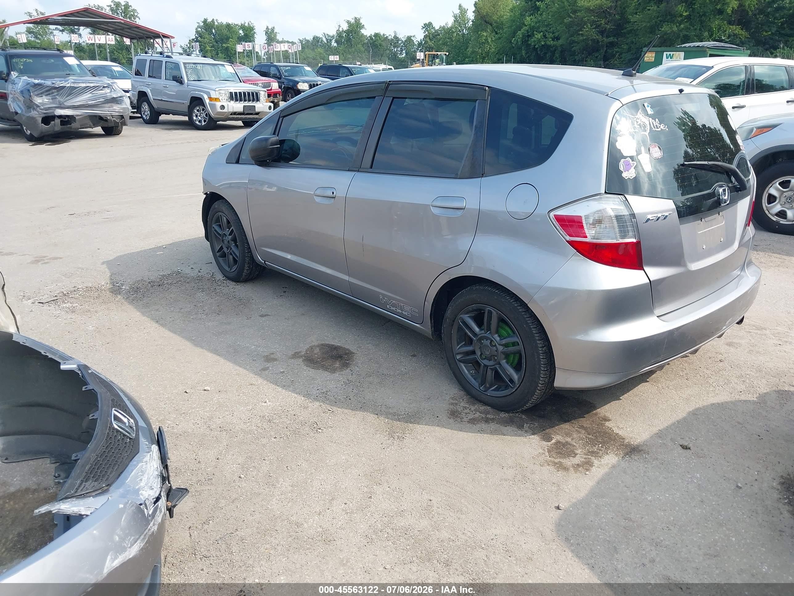 2009 Honda Fit   Gray vin: JHMGE88289S057583