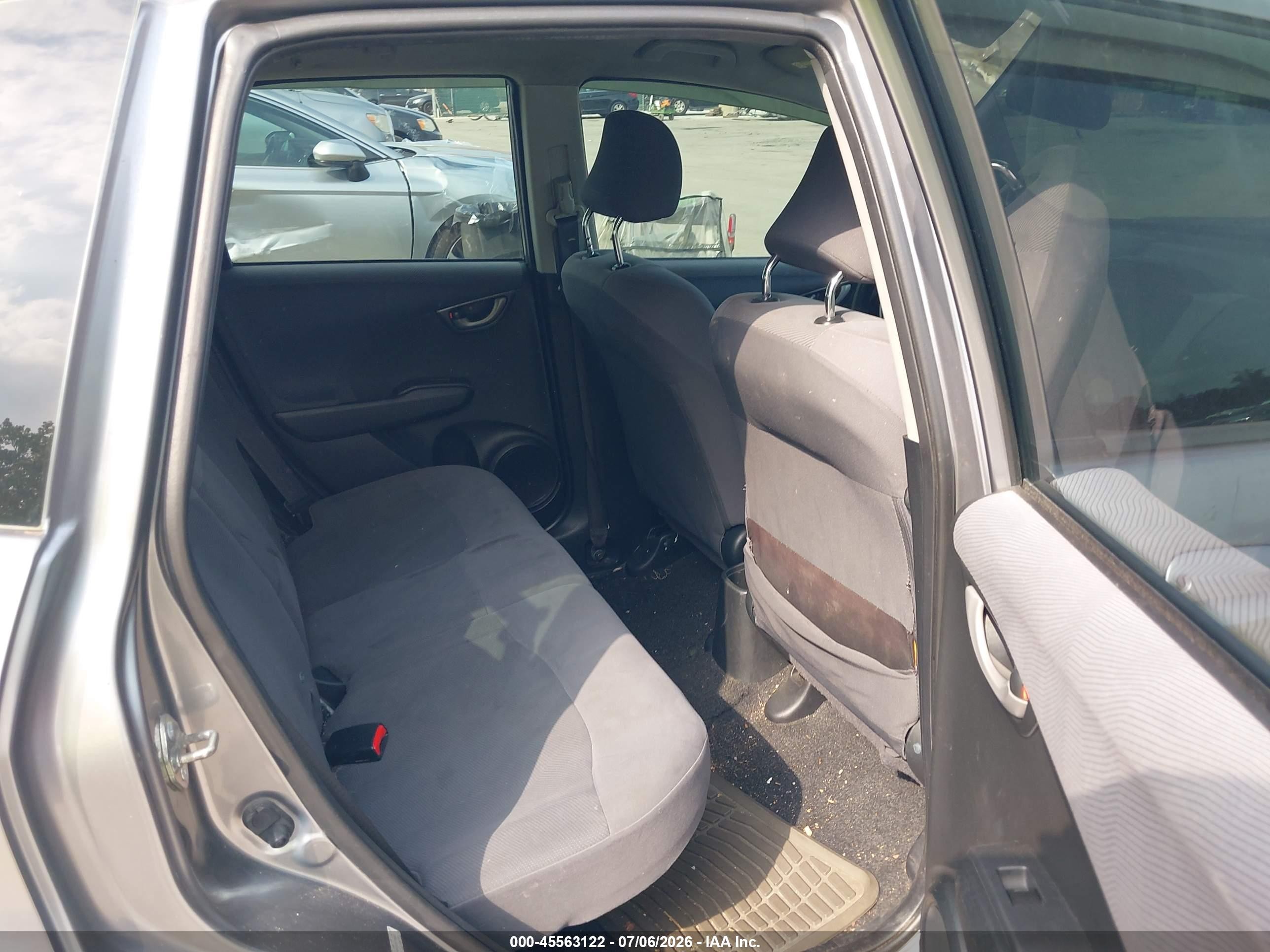 2009 Honda Fit   Gray vin: JHMGE88289S057583