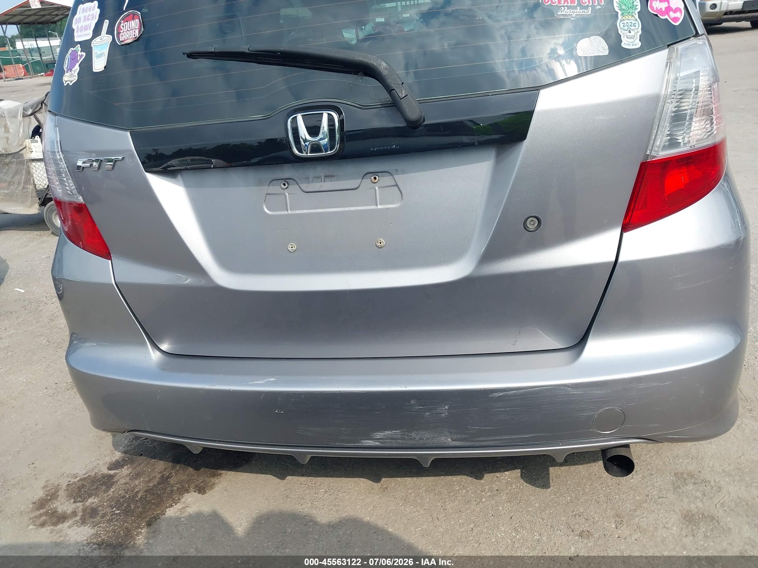2009 Honda Fit   Gray vin: JHMGE88289S057583