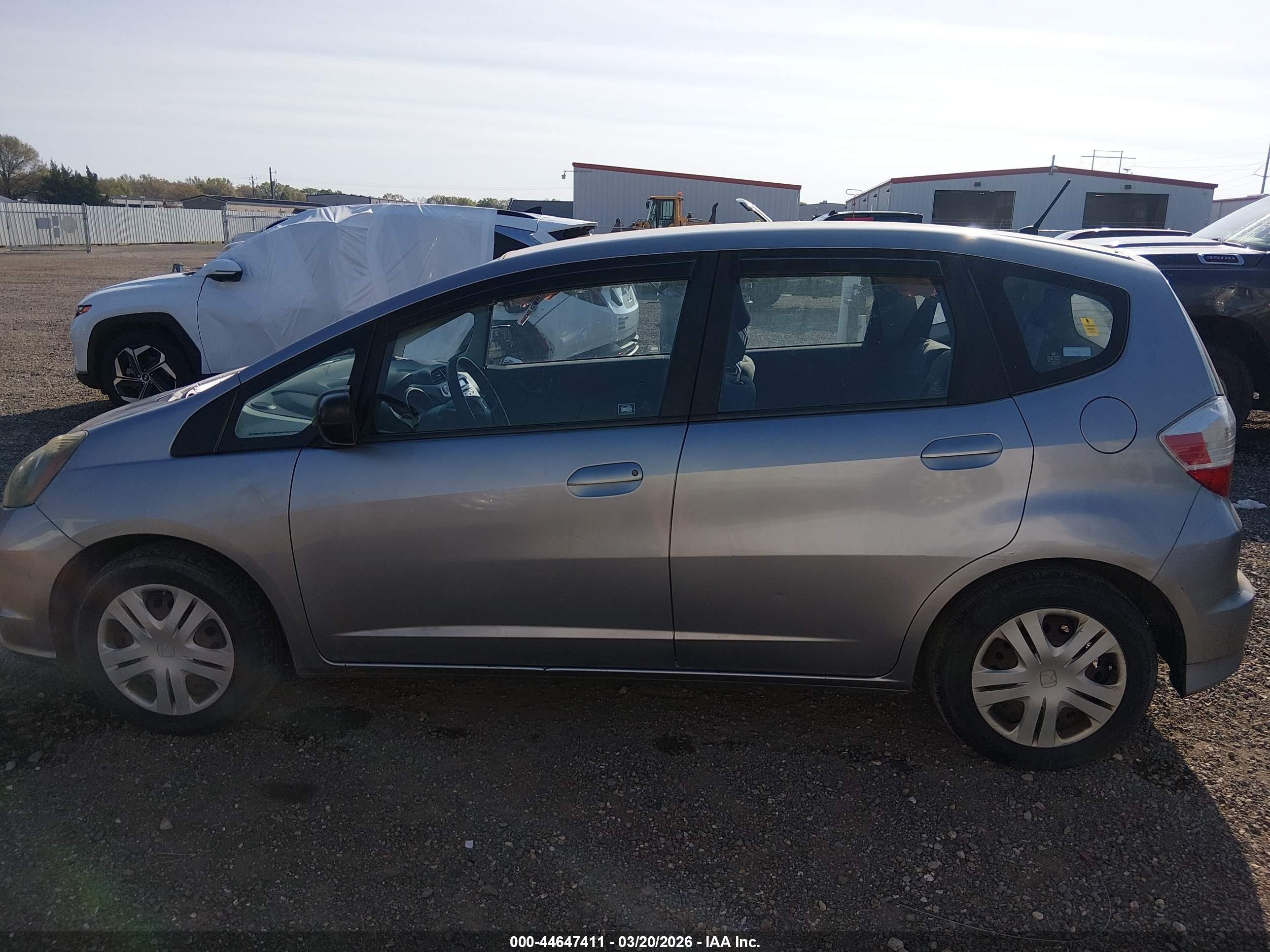 2009 Honda Fit   Silver vin: JHMGE88289S069832