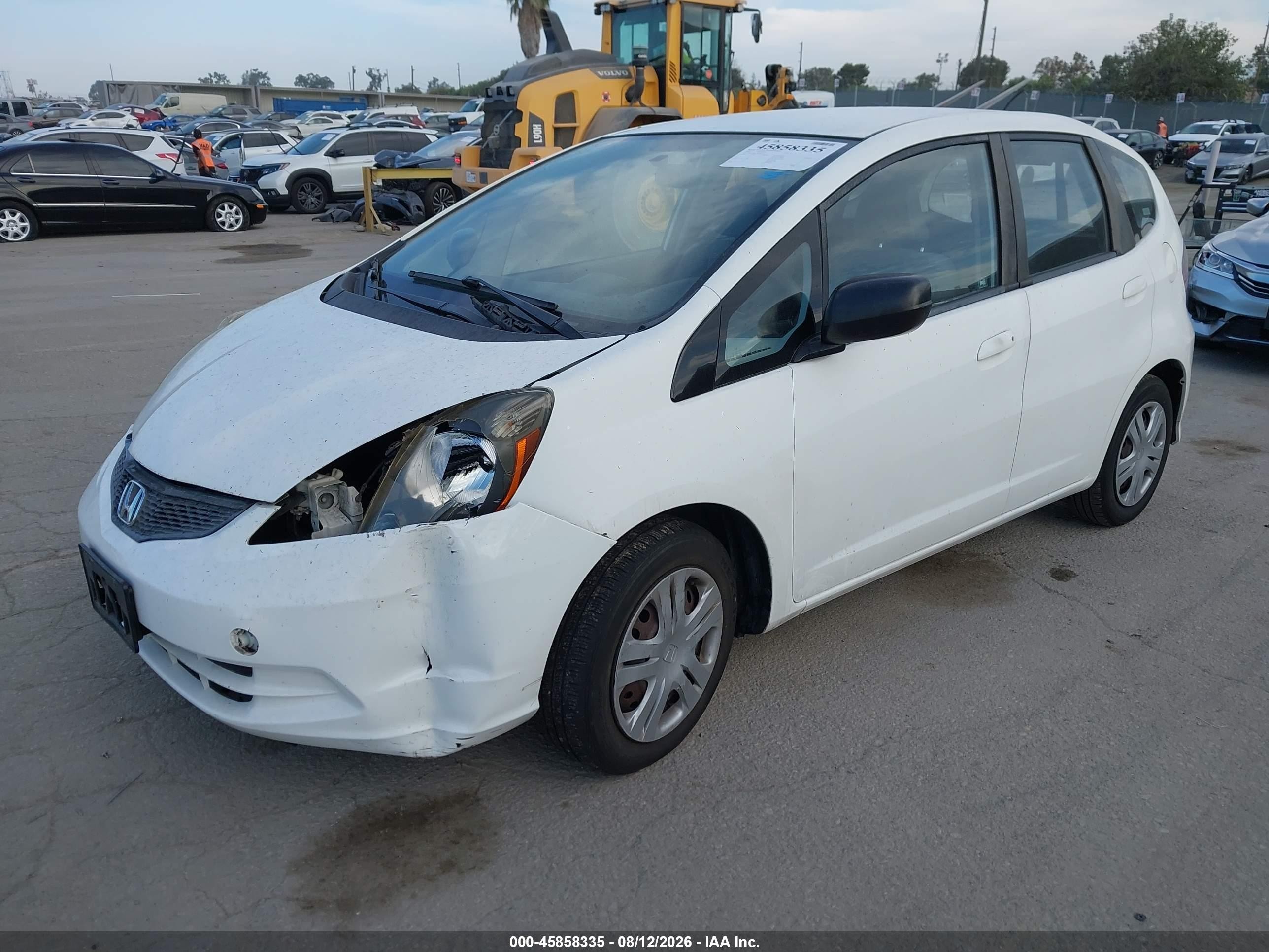 2009 Honda Fit   White vin: JHMGE88299C002232
