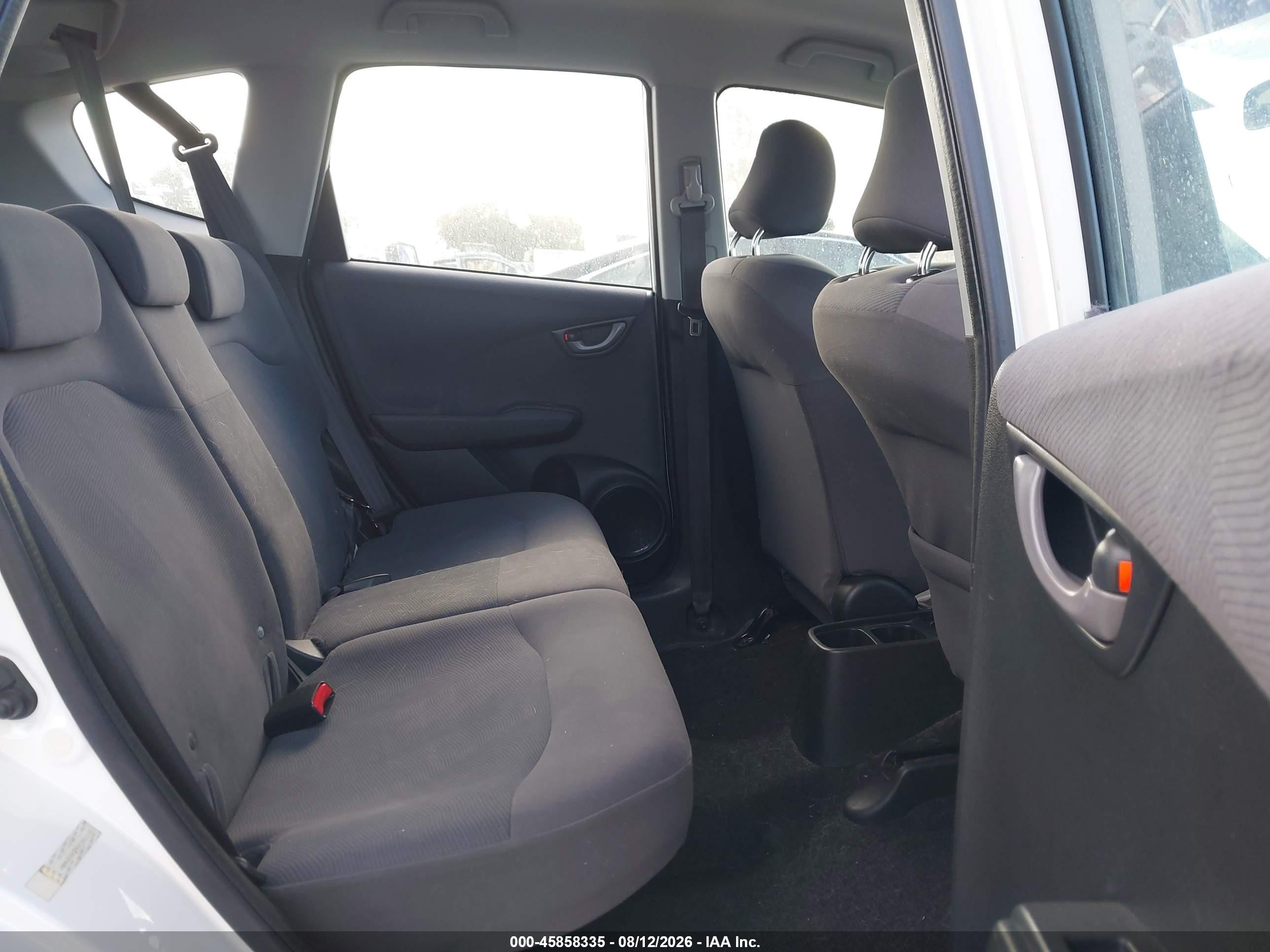 2009 Honda Fit   White vin: JHMGE88299C002232
