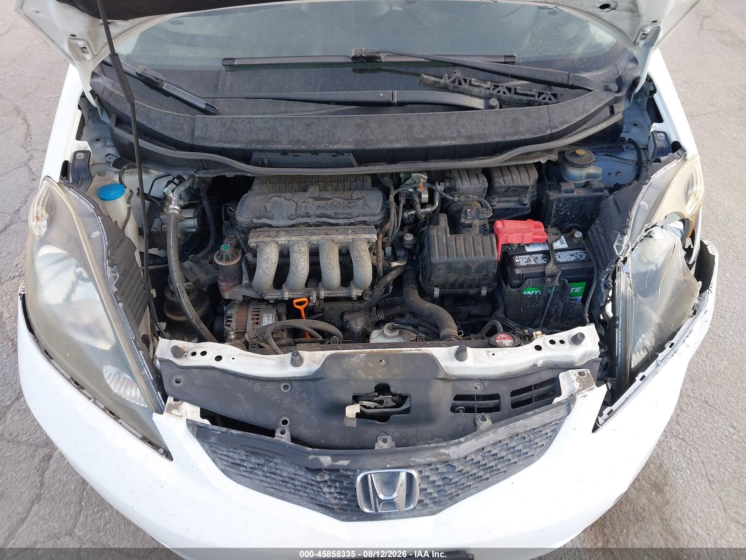 2009 Honda Fit   White vin: JHMGE88299C002232
