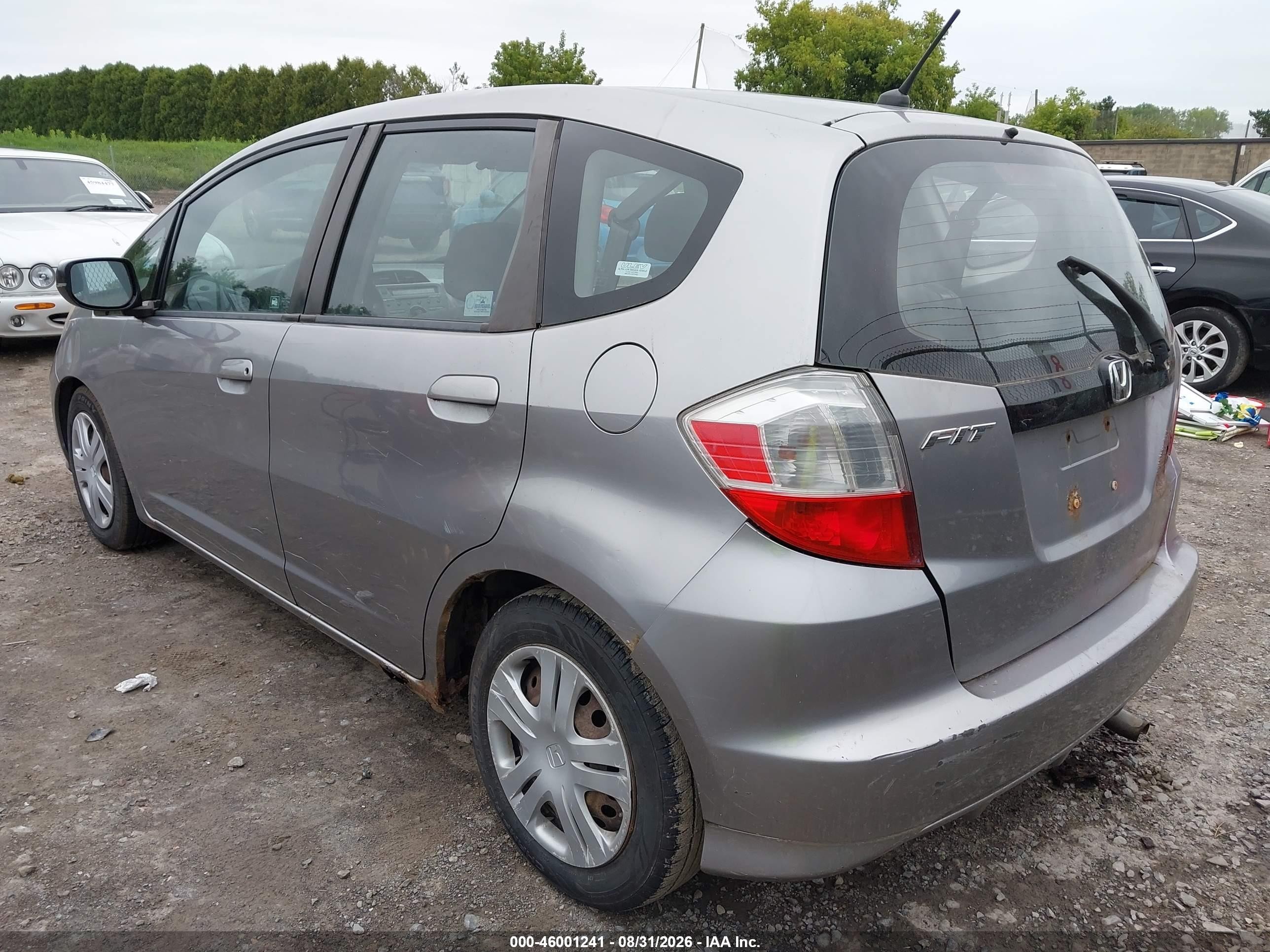 2009 Honda Fit   Silver vin: JHMGE88299S015651
