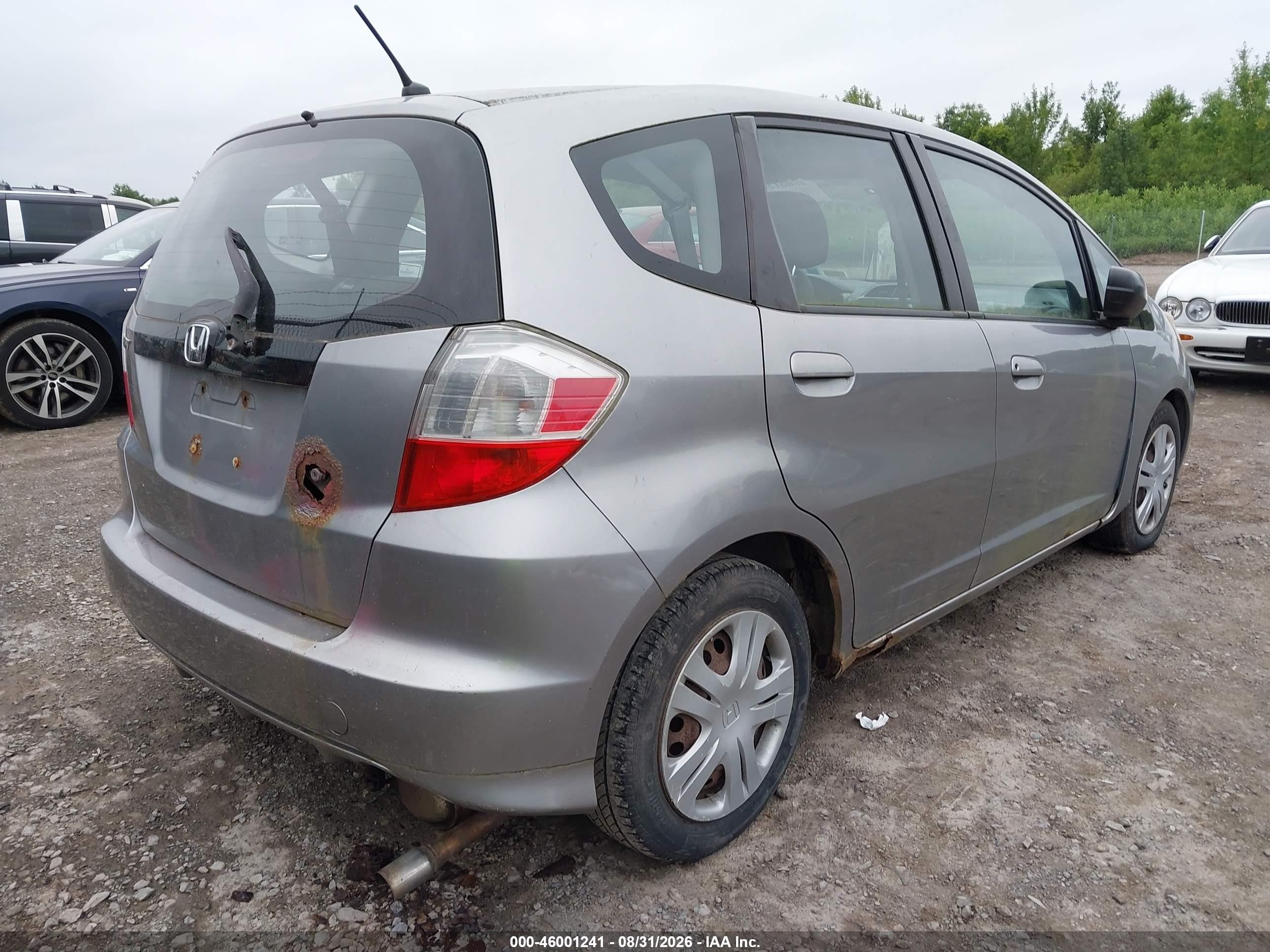 2009 Honda Fit   Silver vin: JHMGE88299S015651