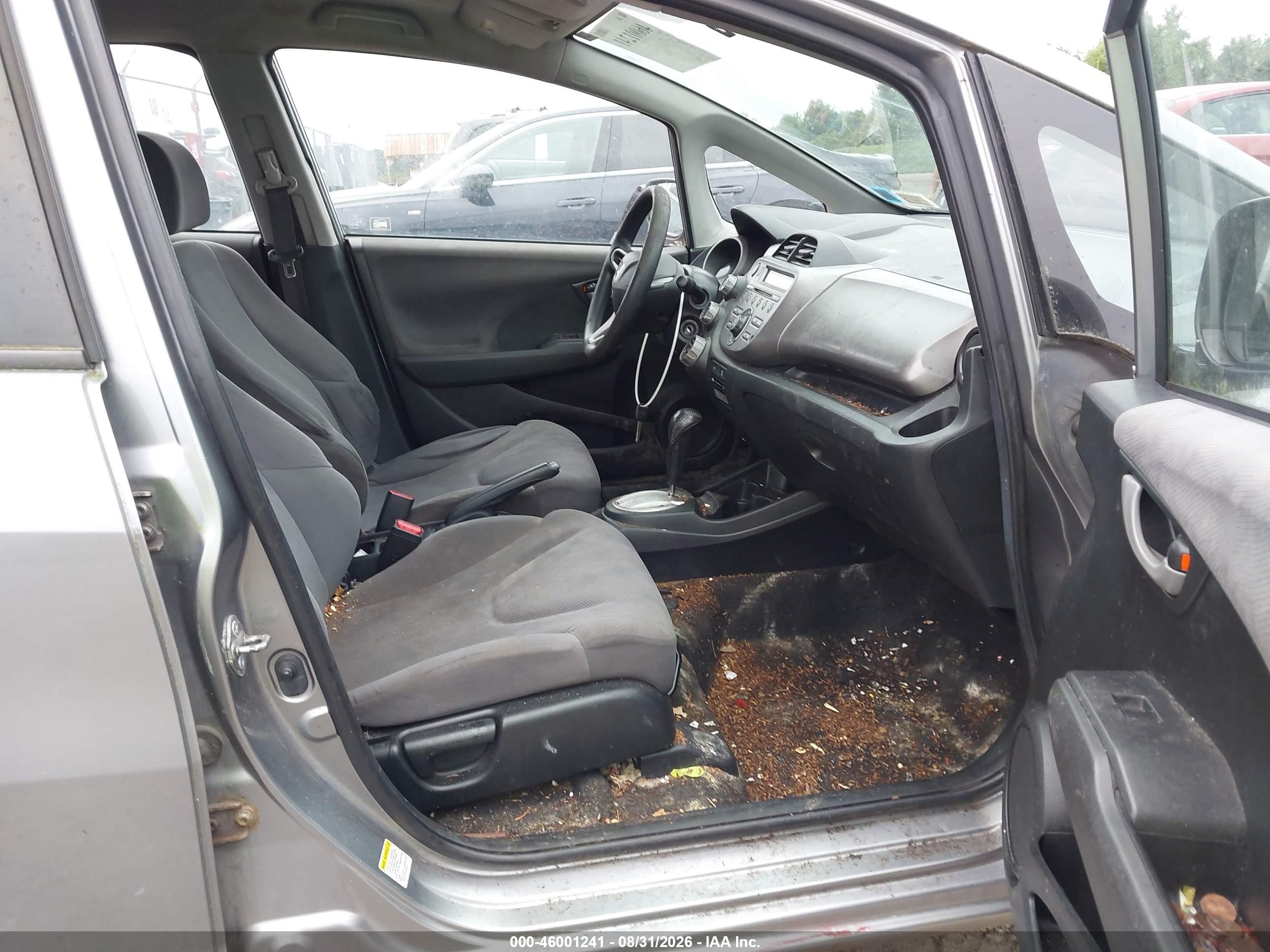 2009 Honda Fit   Silver vin: JHMGE88299S015651
