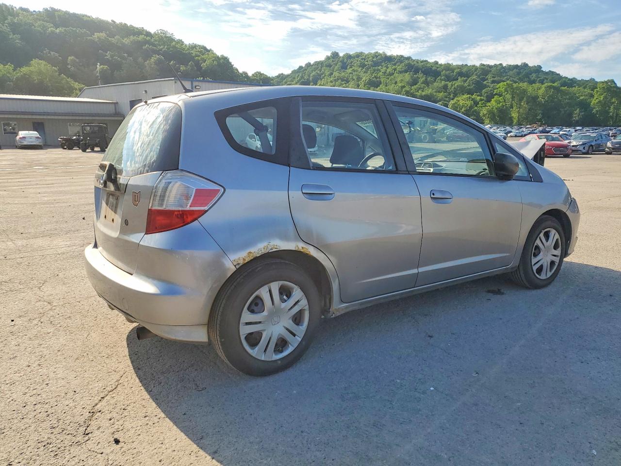 2009 Honda Fit Silver vin: JHMGE88299S043949