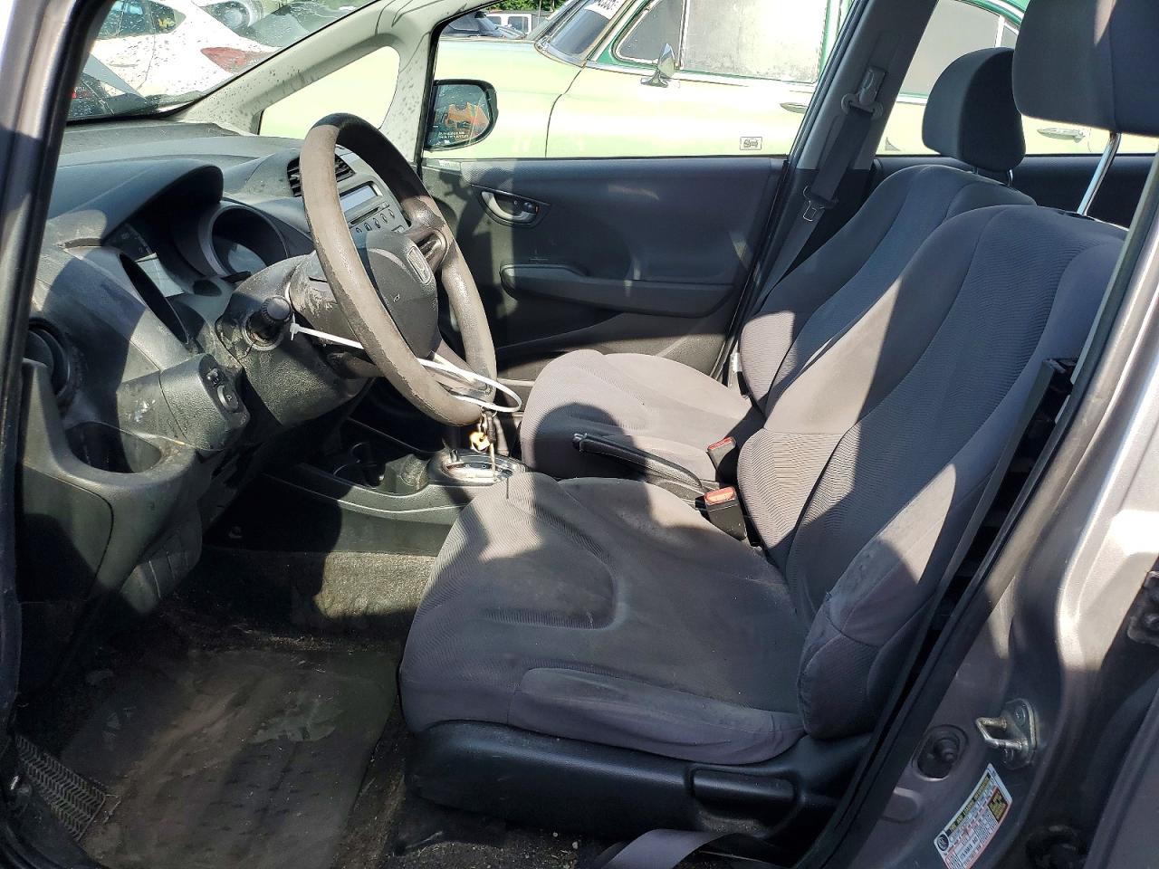 2009 Honda Fit Silver vin: JHMGE88299S043949