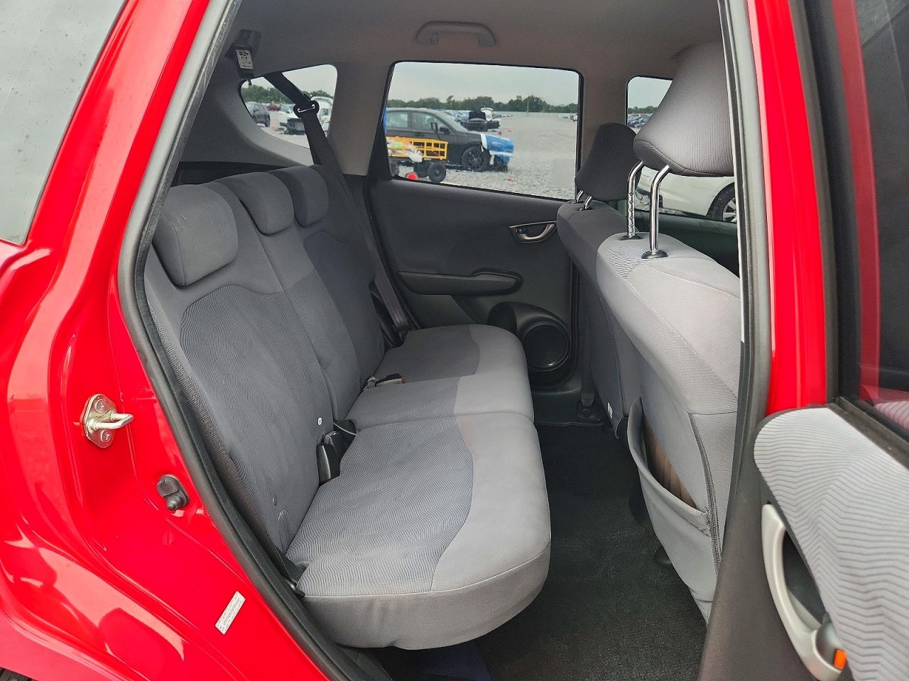 2009 Honda Fit Red vin: JHMGE88299S044390