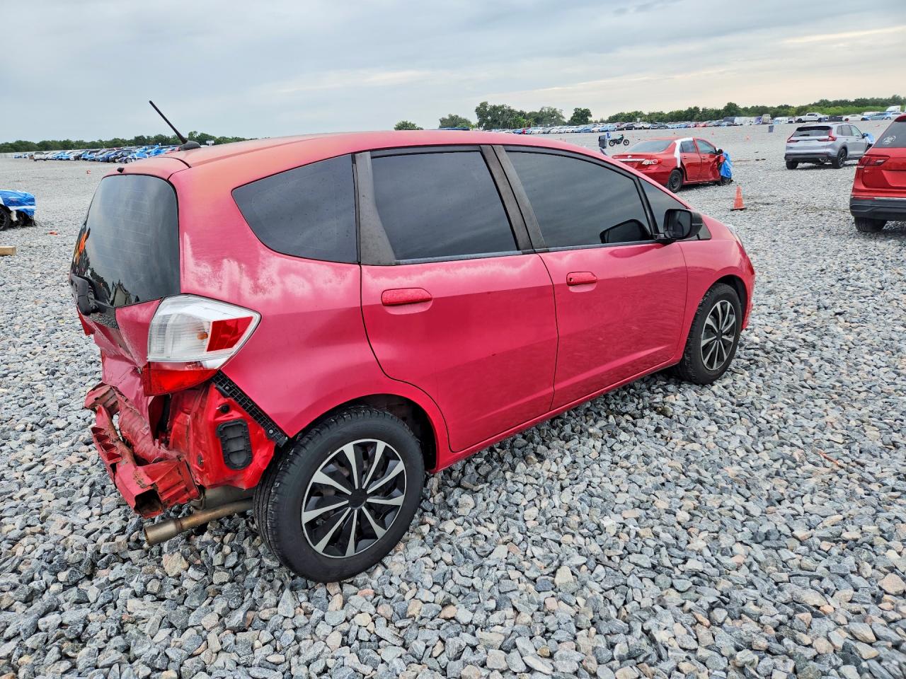 2009 Honda Fit Red vin: JHMGE88299S044390