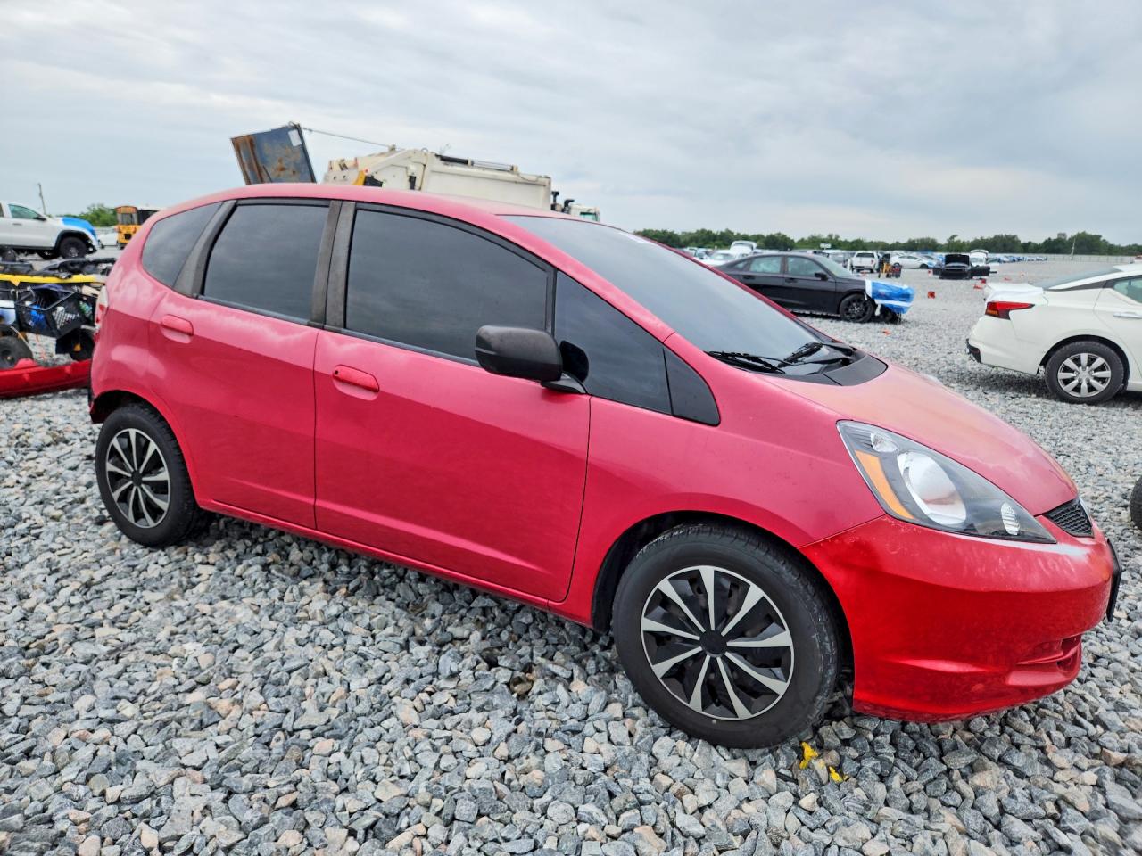 2009 Honda Fit Red vin: JHMGE88299S044390