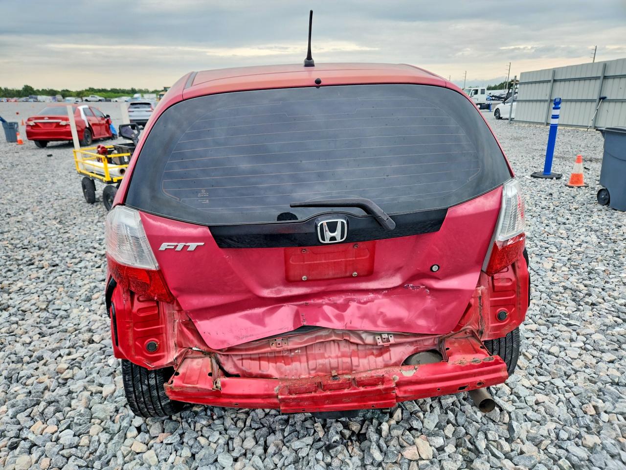 2009 Honda Fit Red vin: JHMGE88299S044390