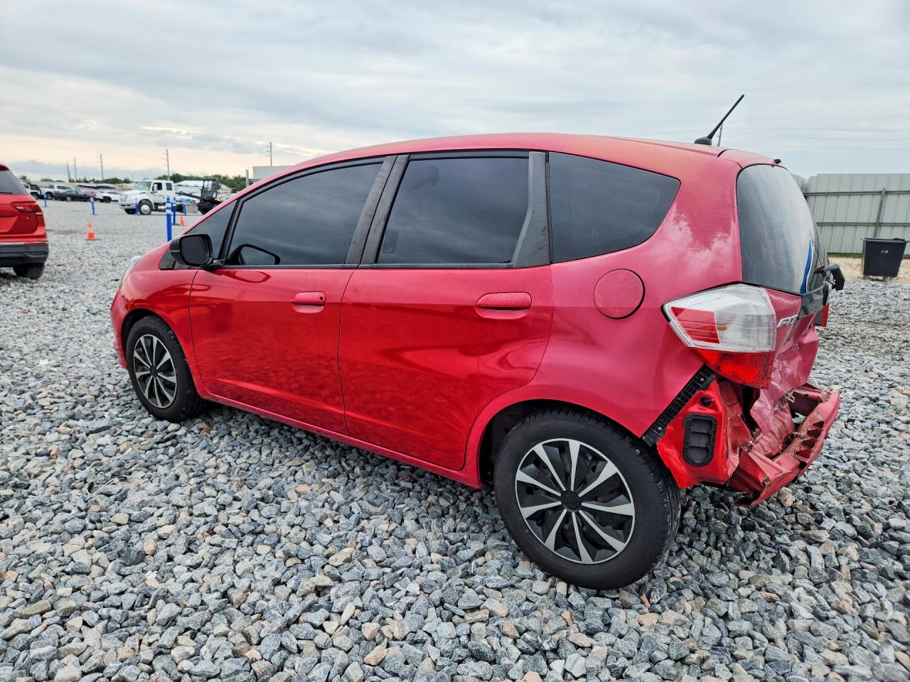 2009 Honda Fit Red vin: JHMGE88299S044390
