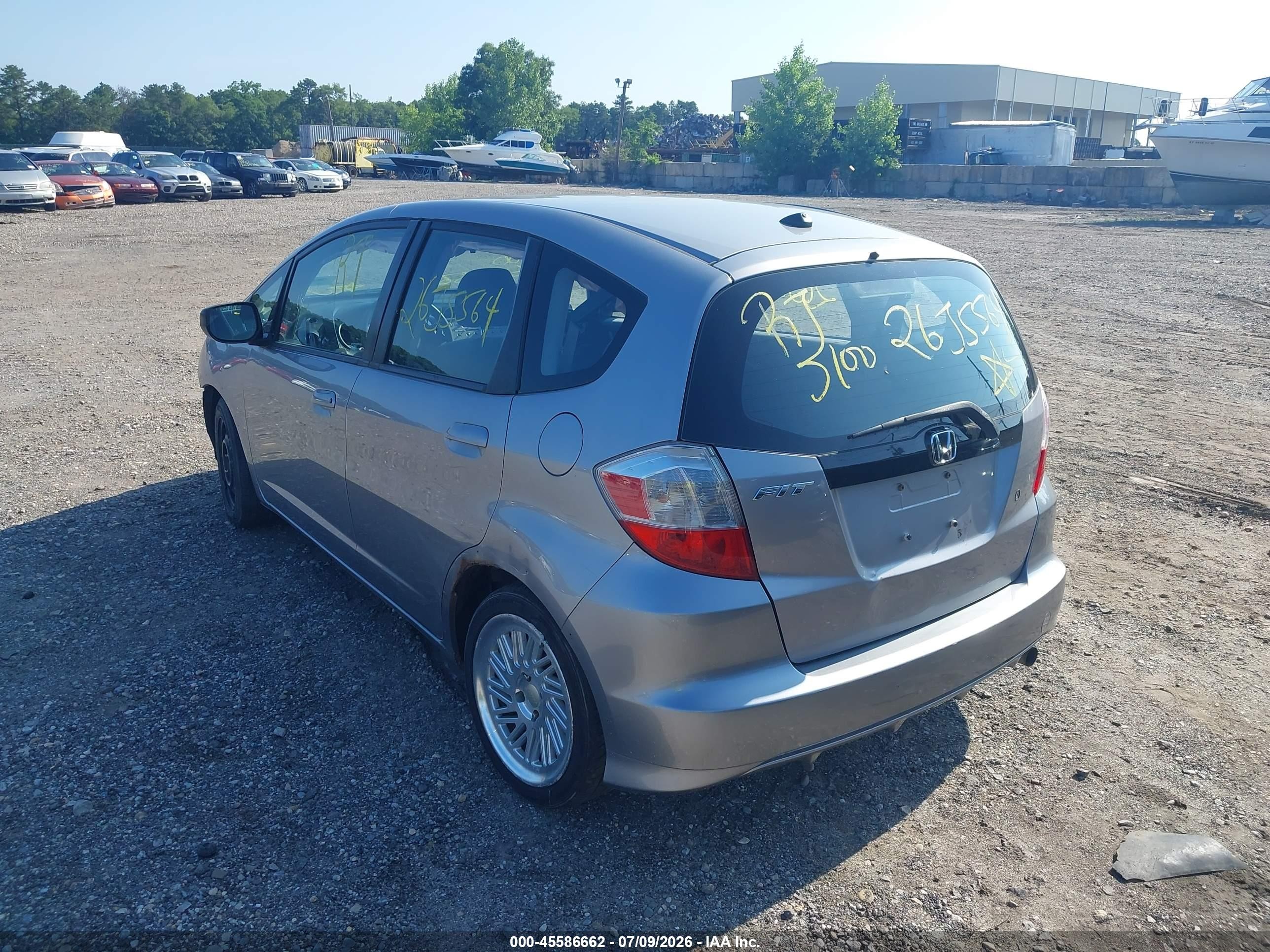 2009 Honda Fit   Silver vin: JHMGE88299S061450