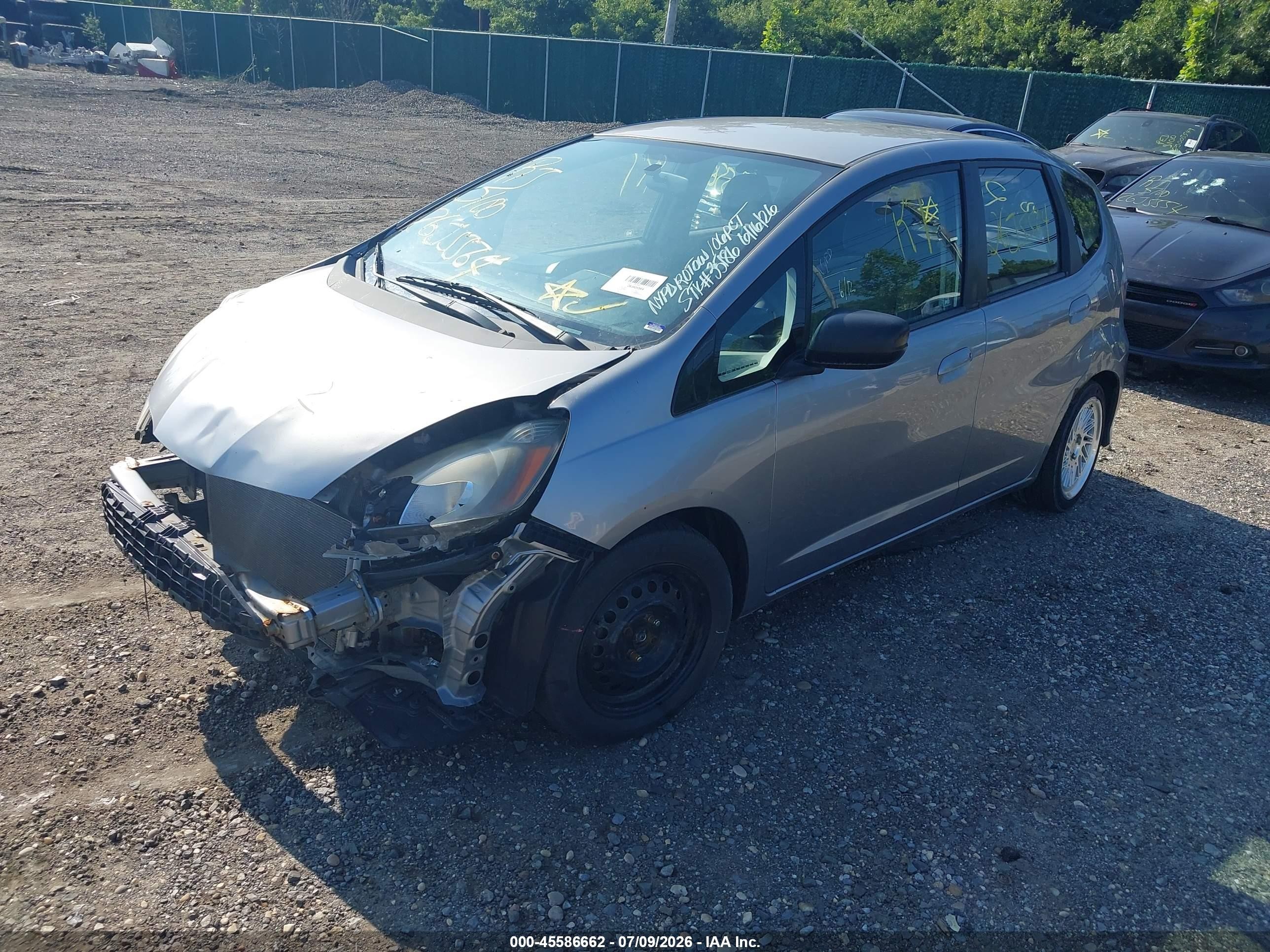 2009 Honda Fit   Silver vin: JHMGE88299S061450