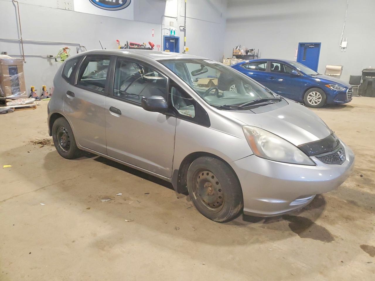 2009 Honda Fit Silver vin: JHMGE88299S801224