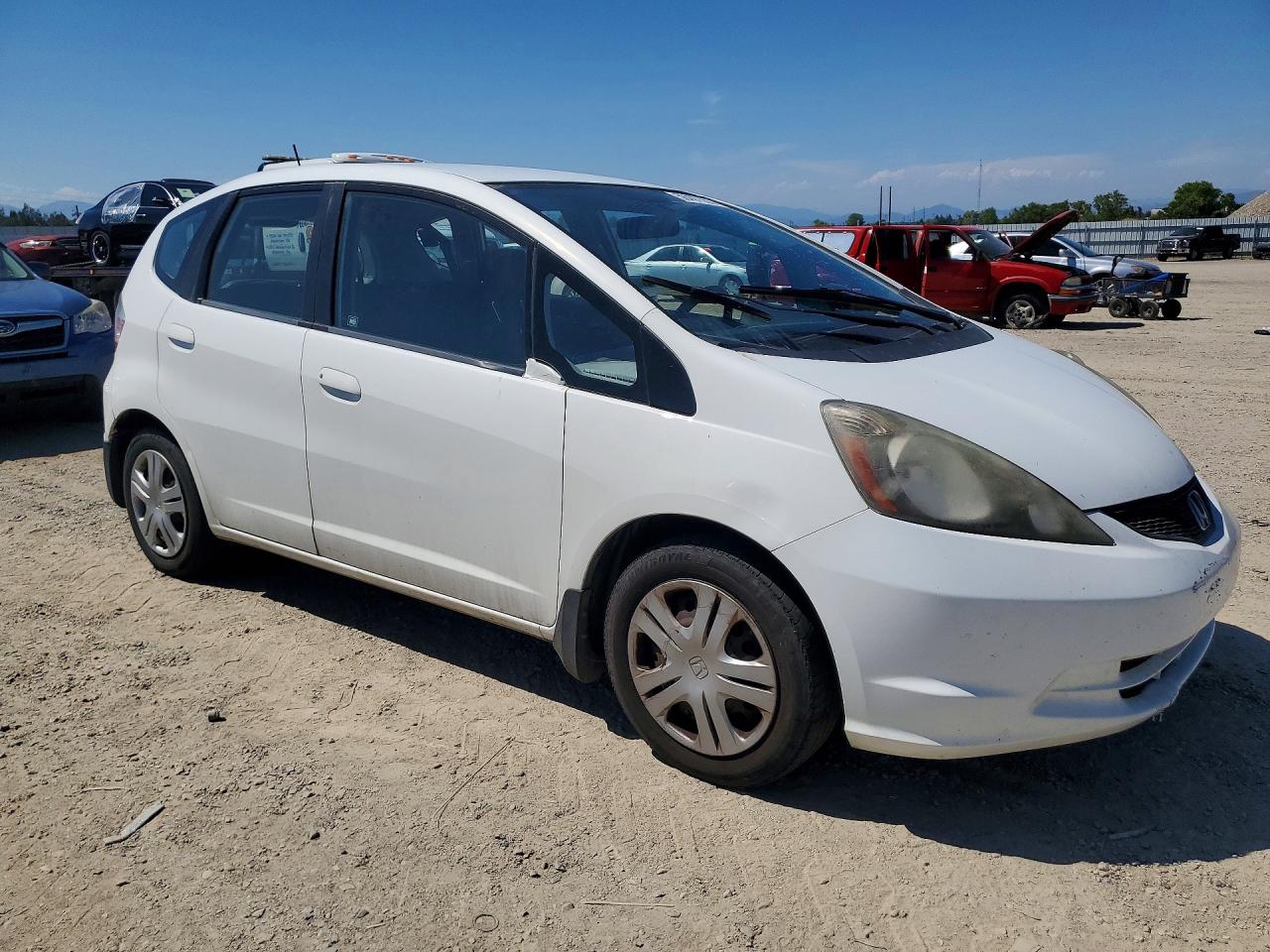 2009 Honda Fit White vin: JHMGE882X9S021913