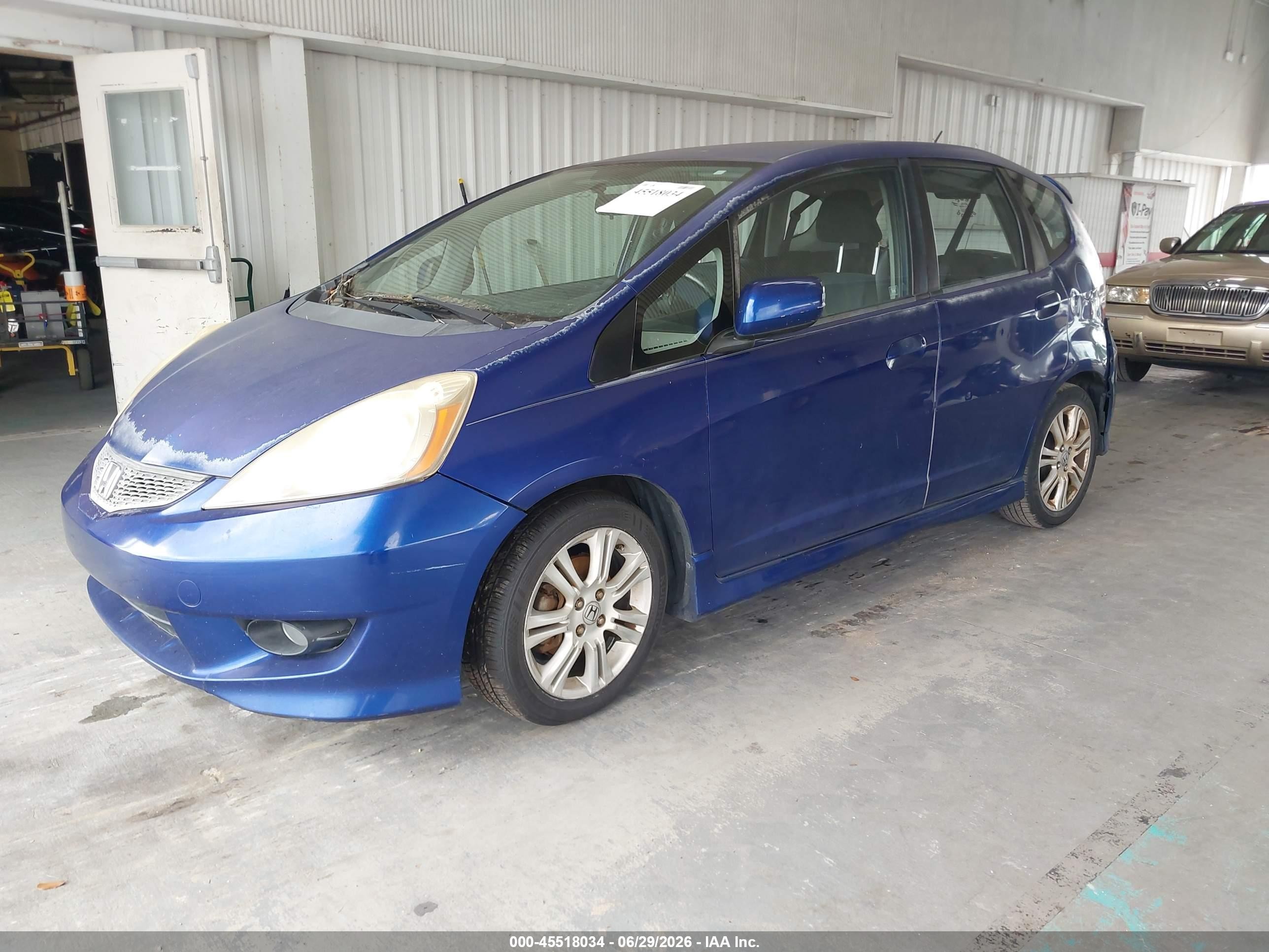2009 Honda Fit Sport Blue vin: JHMGE88409S018178