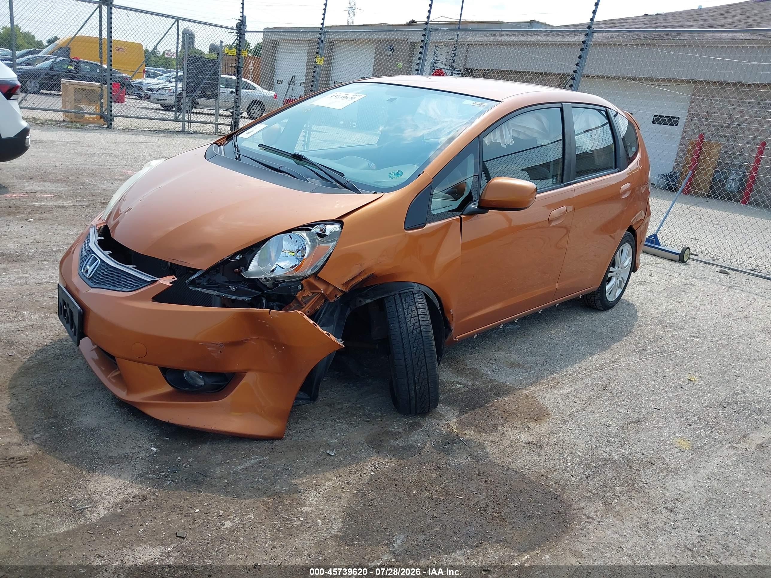 2009 Honda Fit Sport Orange vin: JHMGE88409S039287