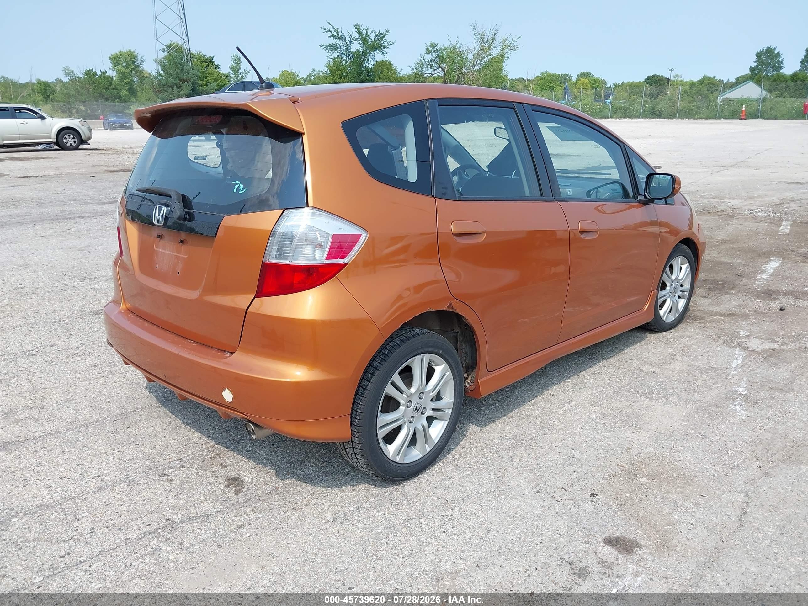 2009 Honda Fit Sport Orange vin: JHMGE88409S039287