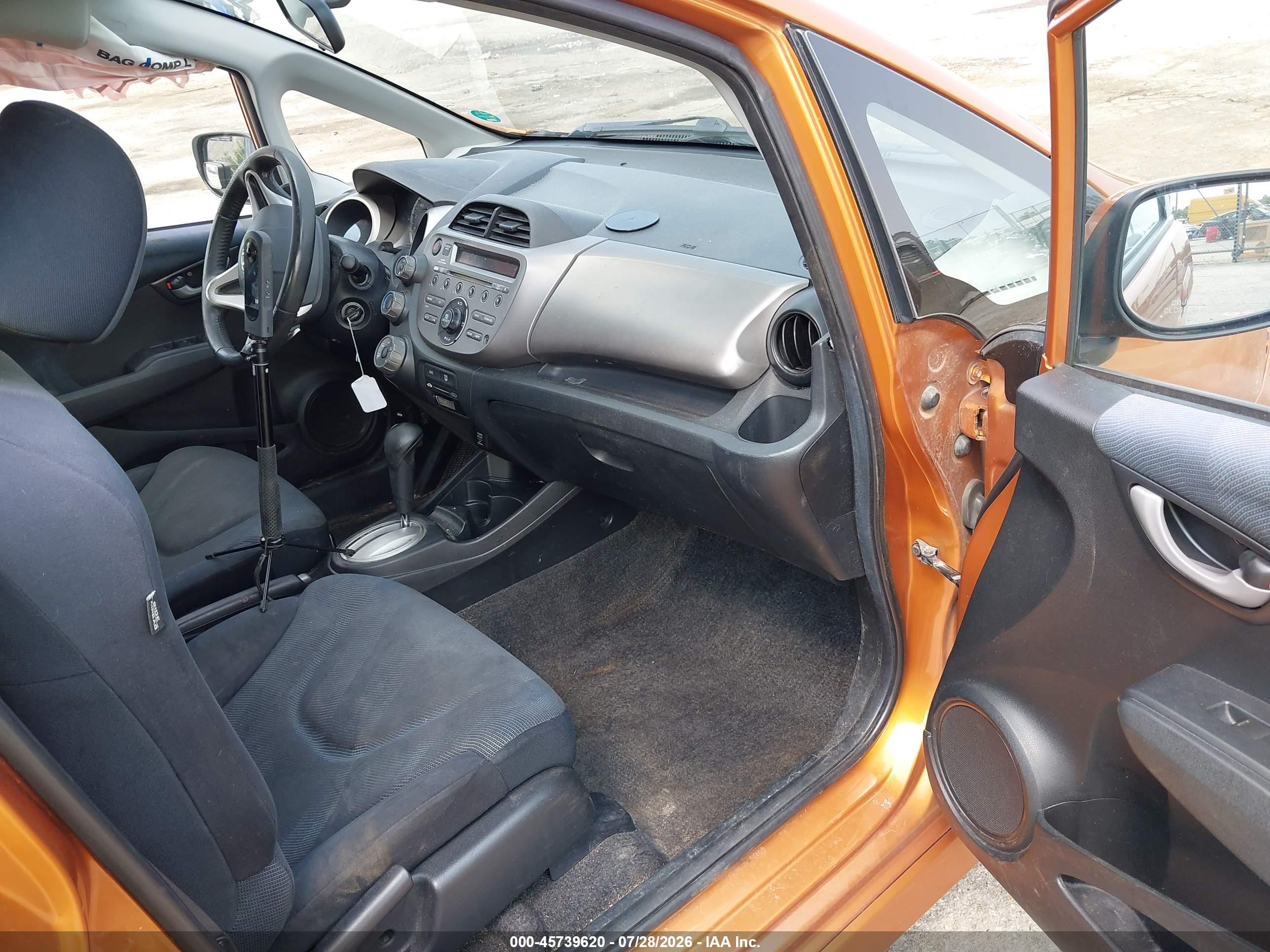 2009 Honda Fit Sport Orange vin: JHMGE88409S039287