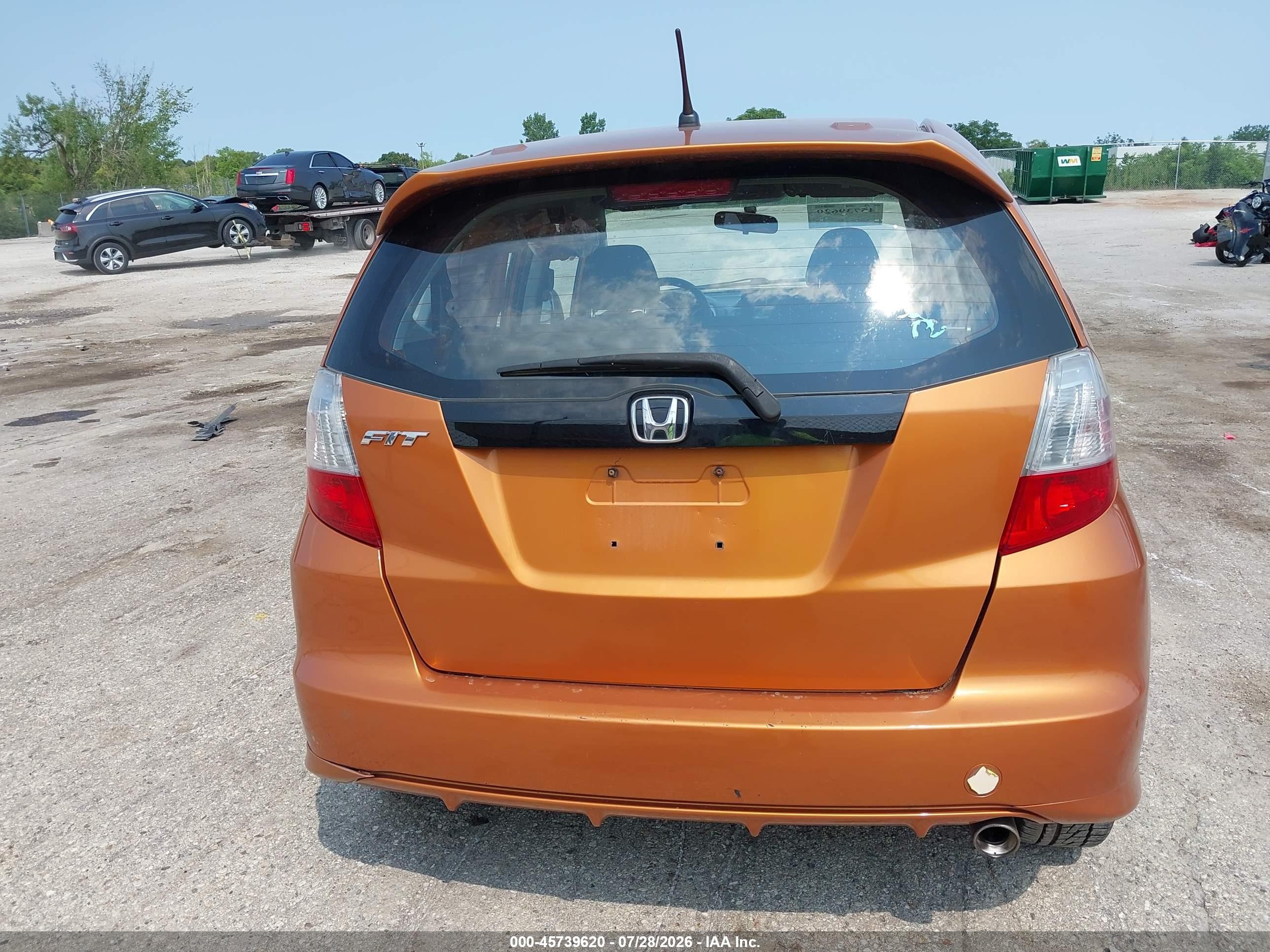 2009 Honda Fit Sport Orange vin: JHMGE88409S039287