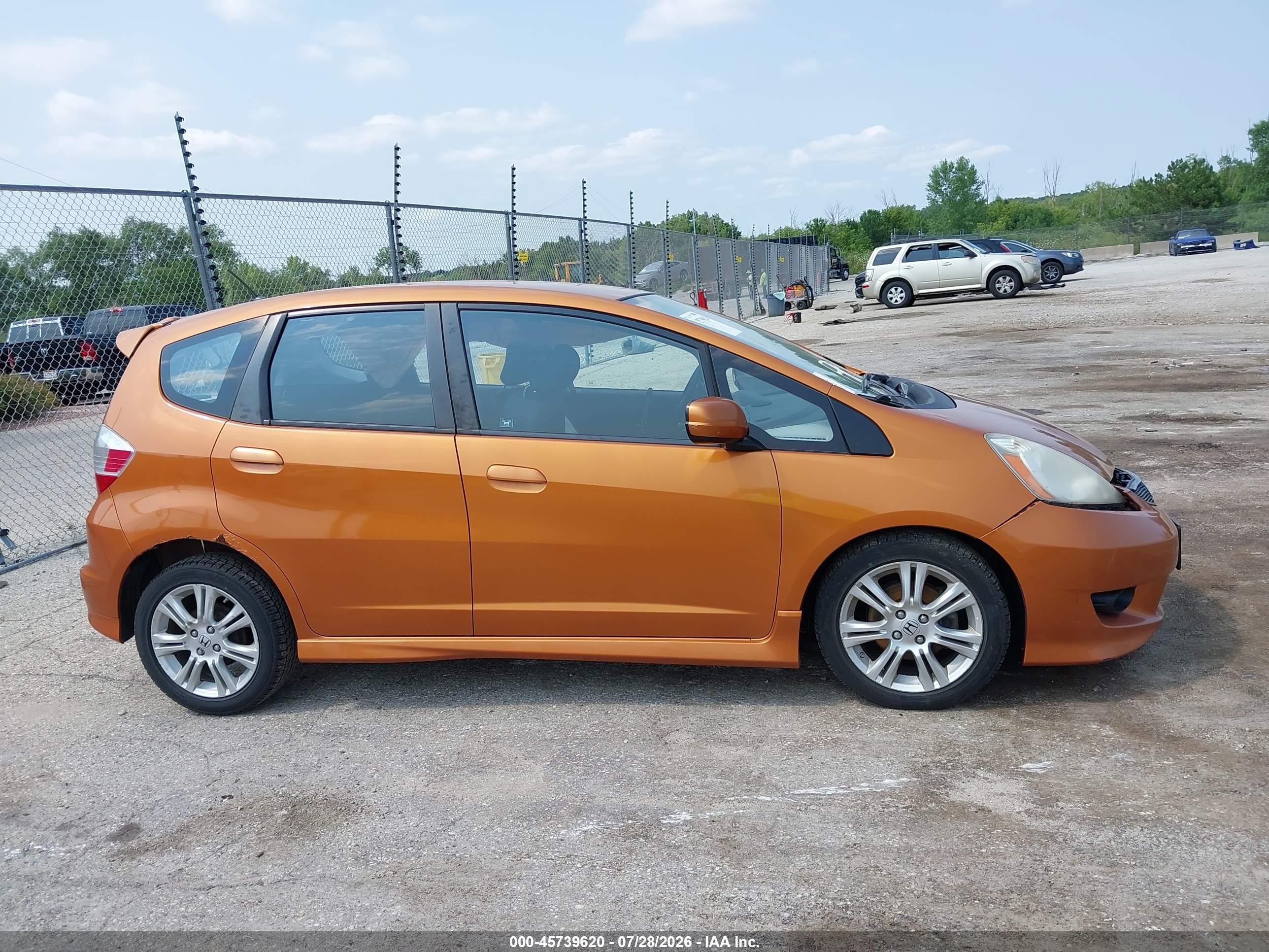2009 Honda Fit Sport Orange vin: JHMGE88409S039287
