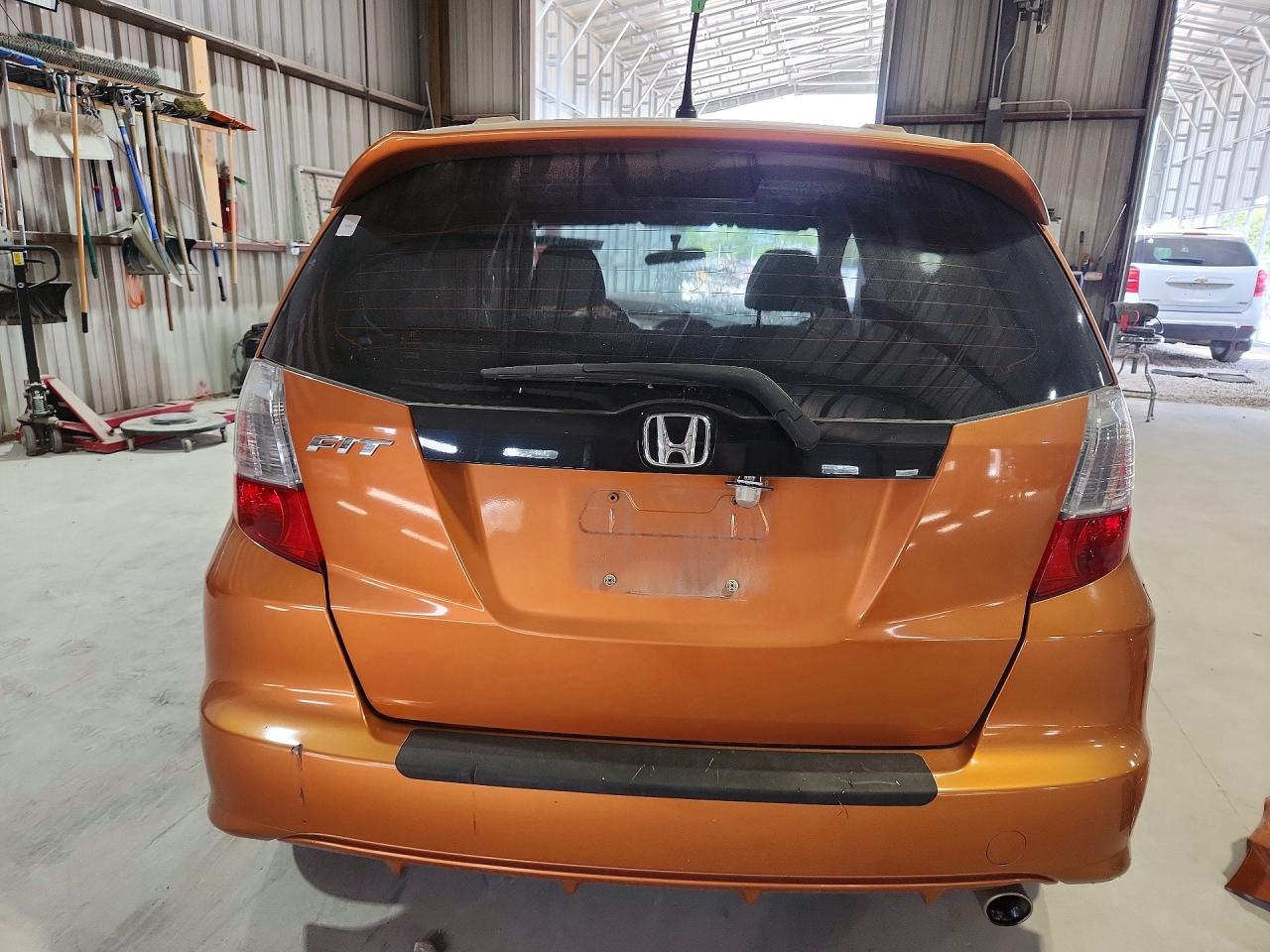 2009 Honda Fit Sport Orange vin: JHMGE88409S066375