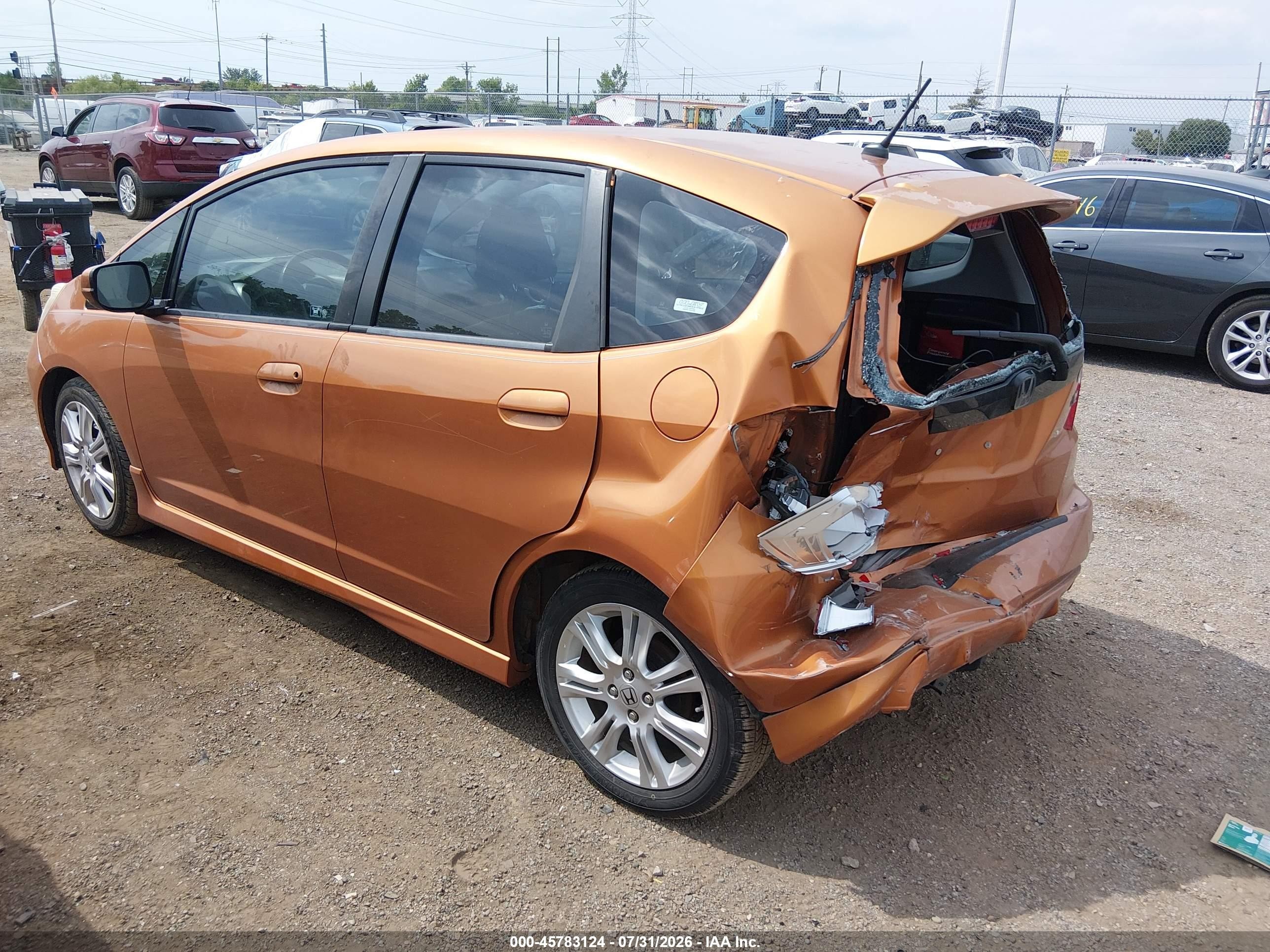 2009 Honda Fit Sport Brown vin: JHMGE88419S041548