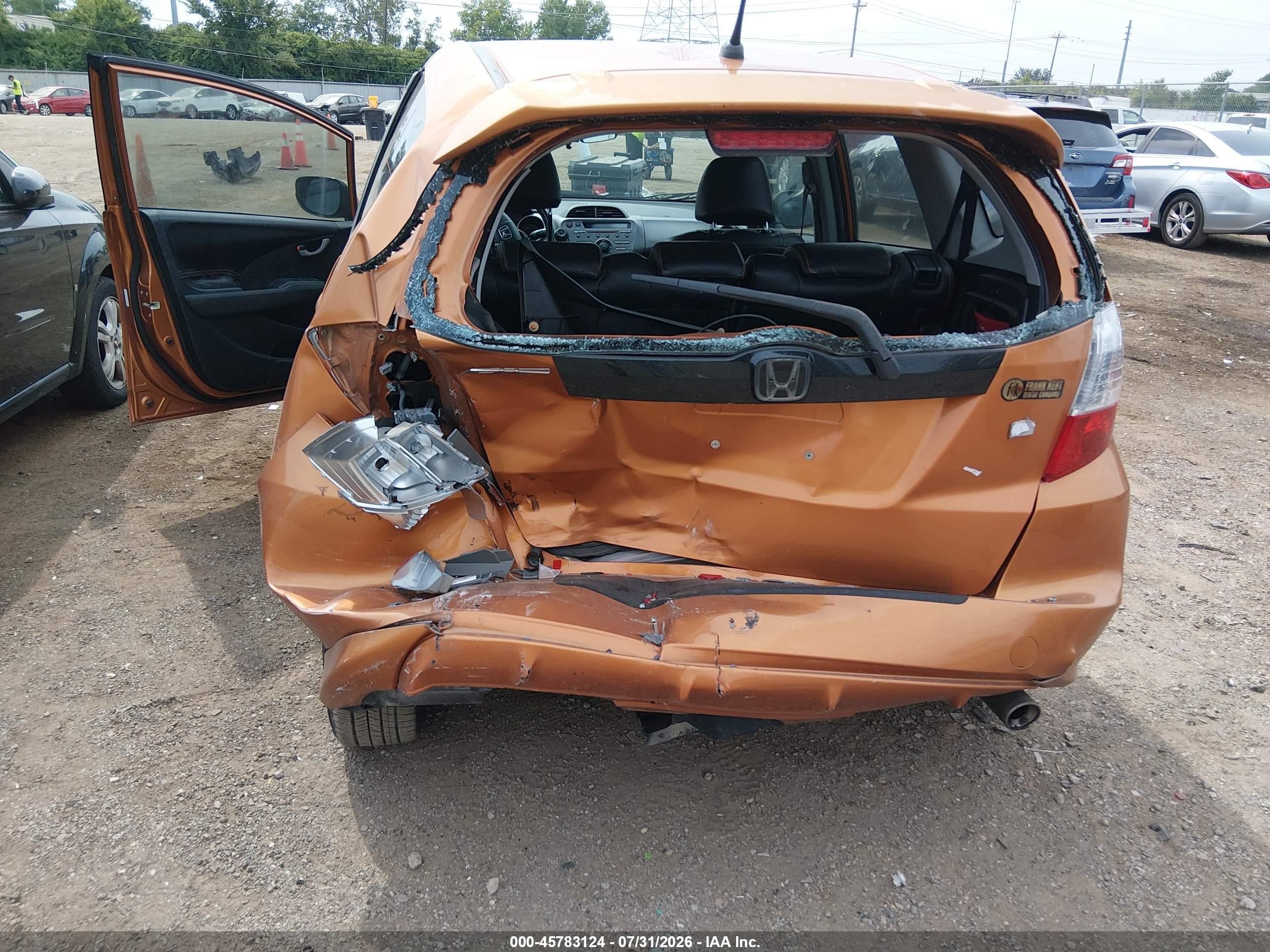 2009 Honda Fit Sport Brown vin: JHMGE88419S041548