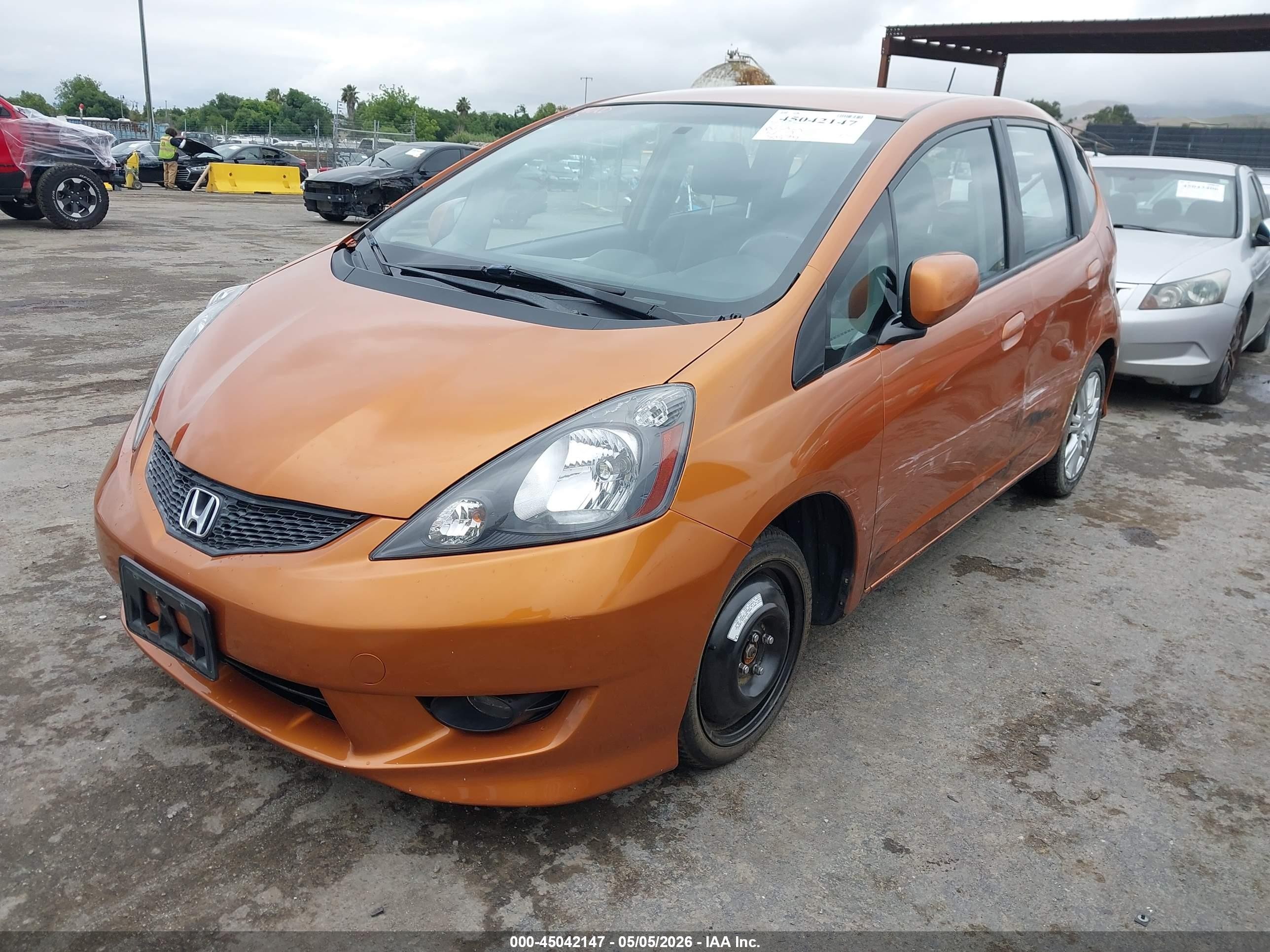 2009 Honda Fit Sport Orange vin: JHMGE88419S061637