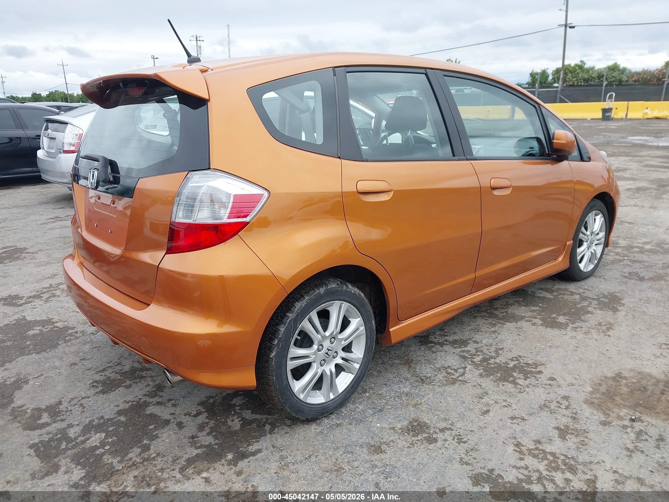 2009 Honda Fit Sport Orange vin: JHMGE88419S061637