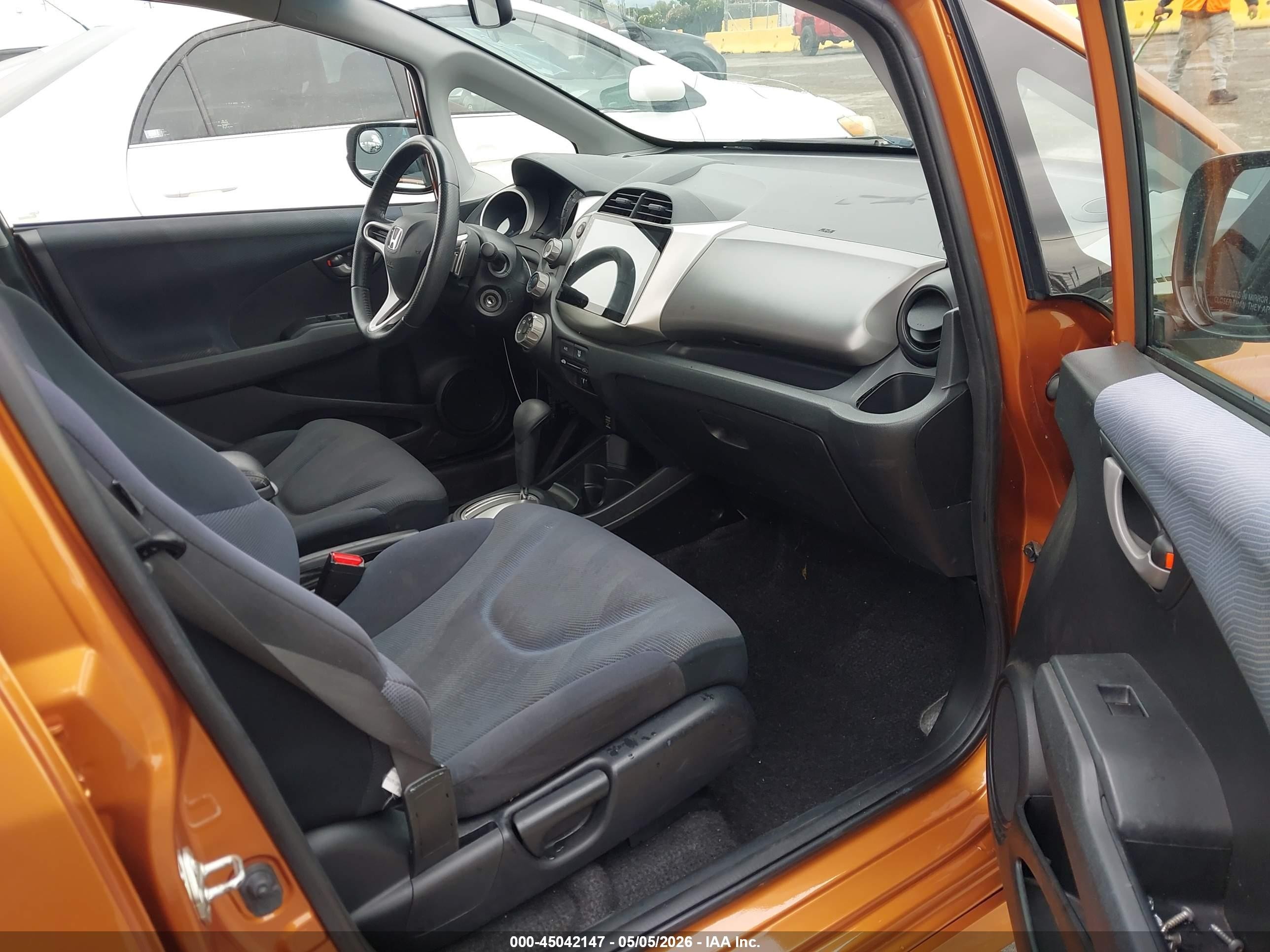 2009 Honda Fit Sport Orange vin: JHMGE88419S061637