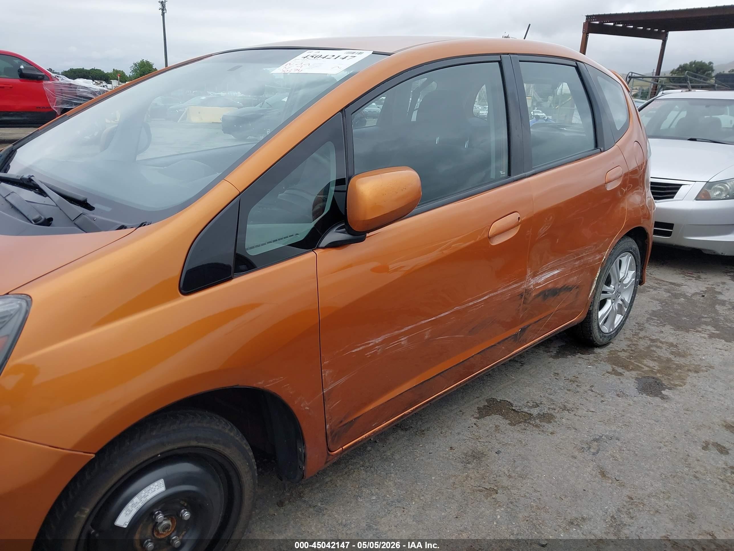 2009 Honda Fit Sport Orange vin: JHMGE88419S061637