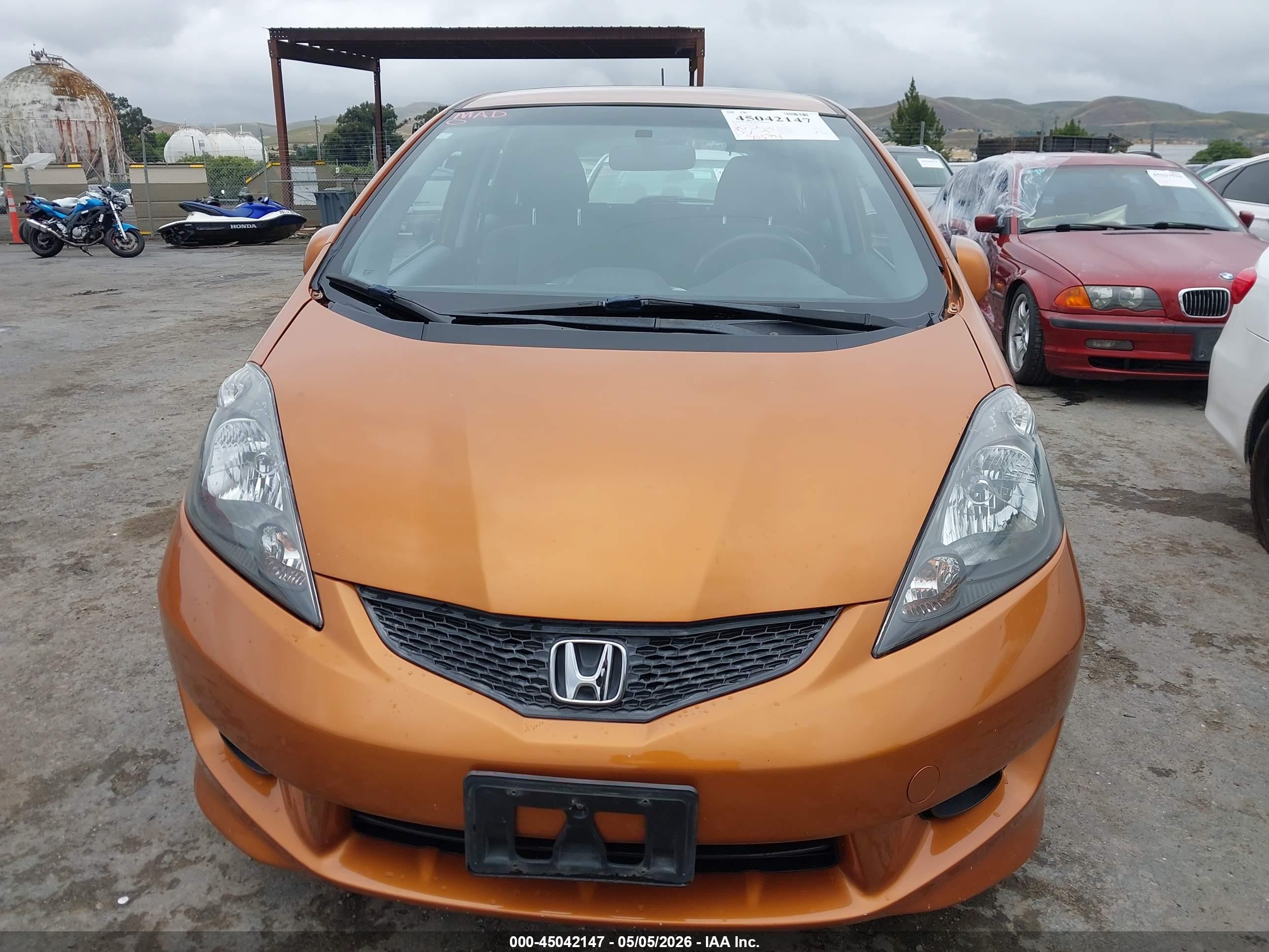 2009 Honda Fit Sport Orange vin: JHMGE88419S061637