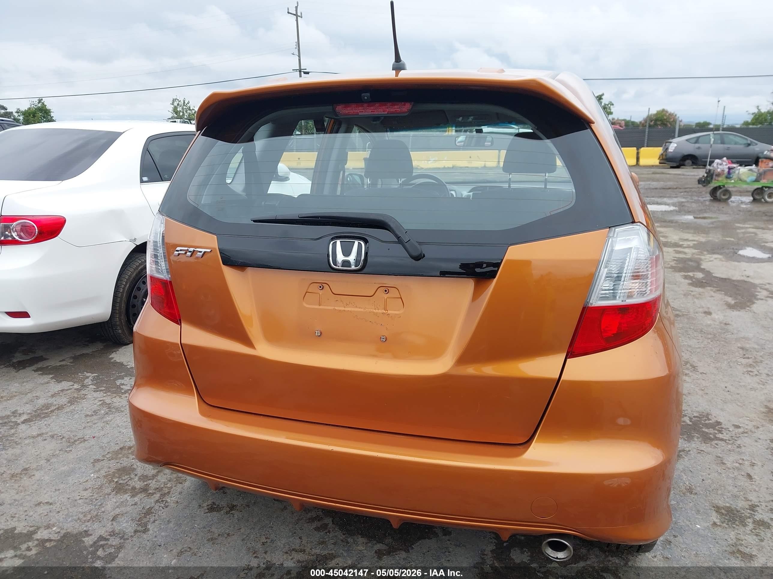 2009 Honda Fit Sport Orange vin: JHMGE88419S061637