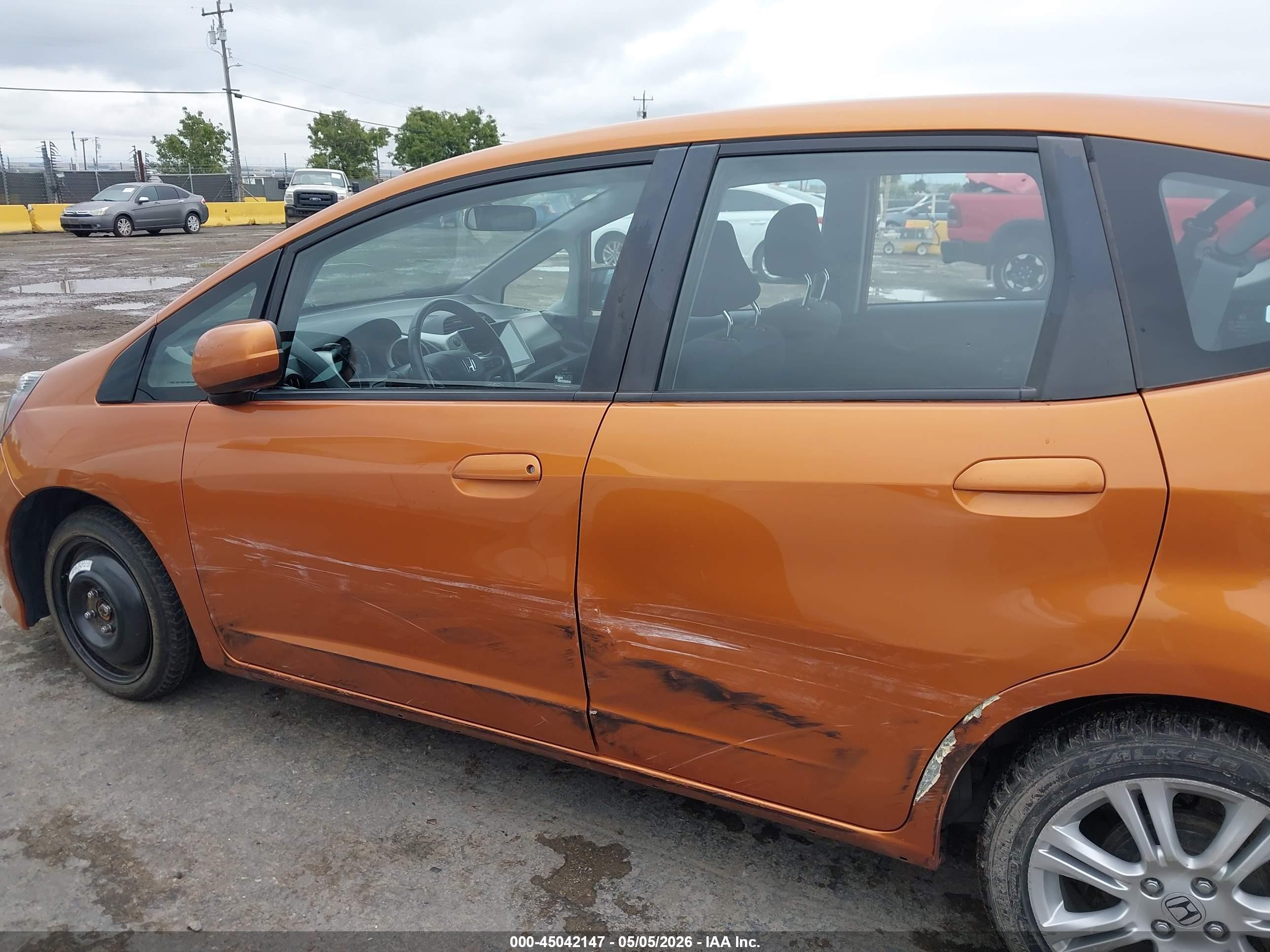 2009 Honda Fit Sport Orange vin: JHMGE88419S061637