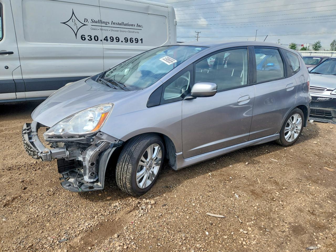 2009 Honda Fit Sport Silver vin: JHMGE88429S012091