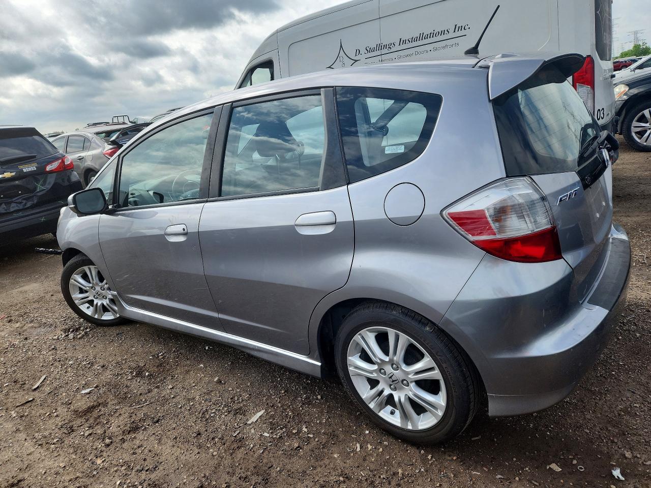 2009 Honda Fit Sport Silver vin: JHMGE88429S012091