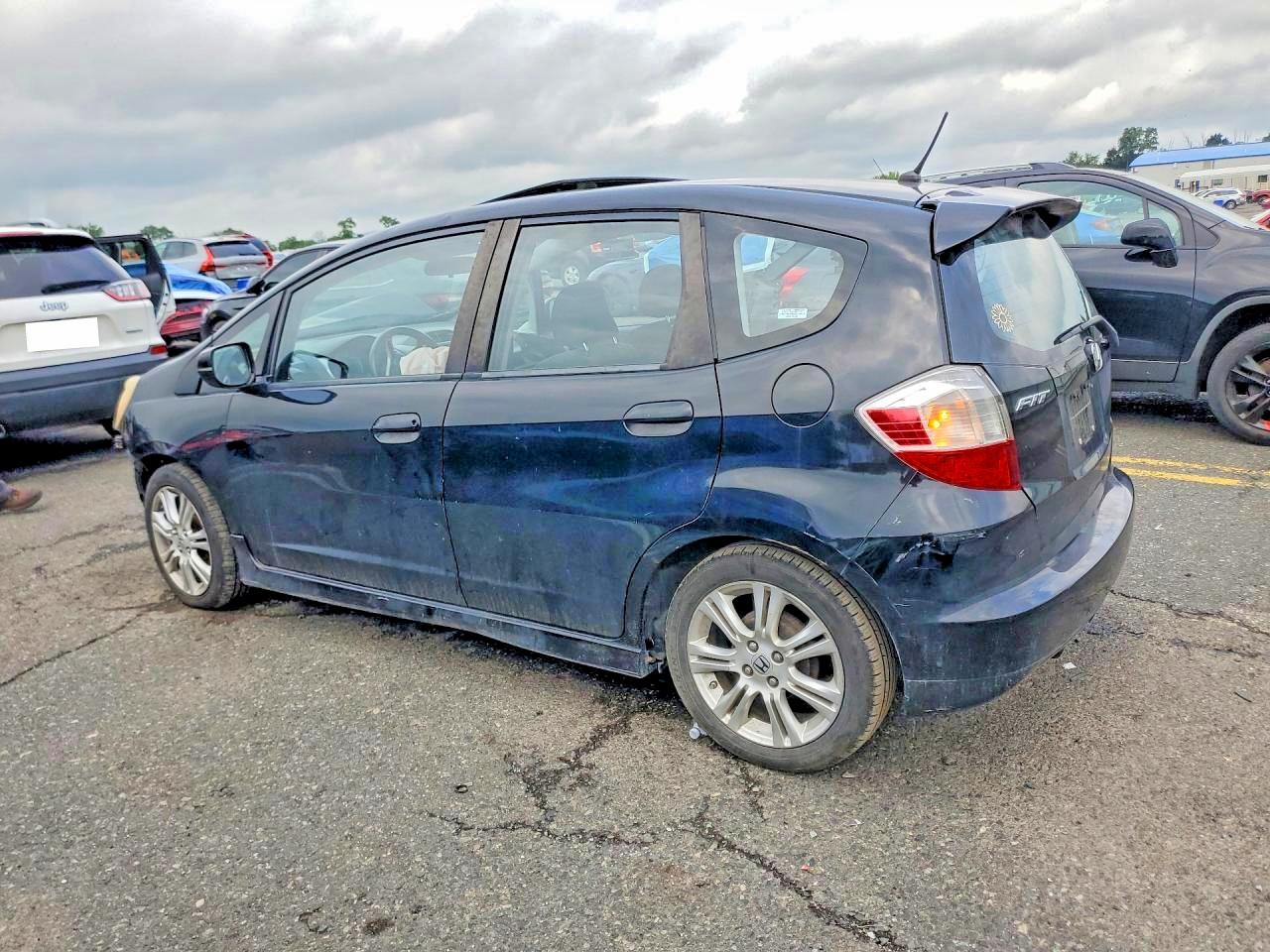 2009 Honda Fit Sport Black vin: JHMGE88429S027724
