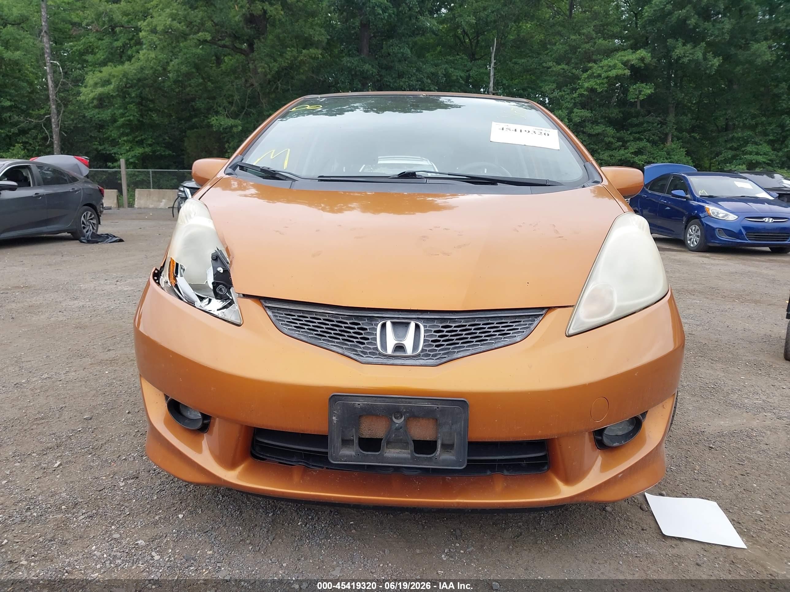 2009 Honda Fit Sport Orange vin: JHMGE88429S033684