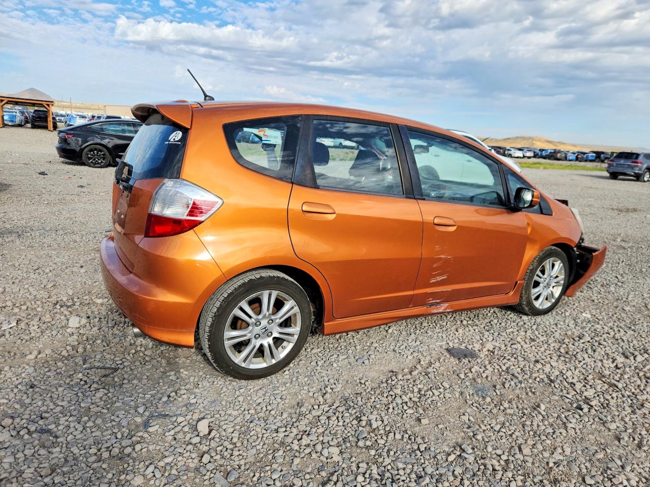 2009 Honda Fit Sport Orange vin: JHMGE88429S058343