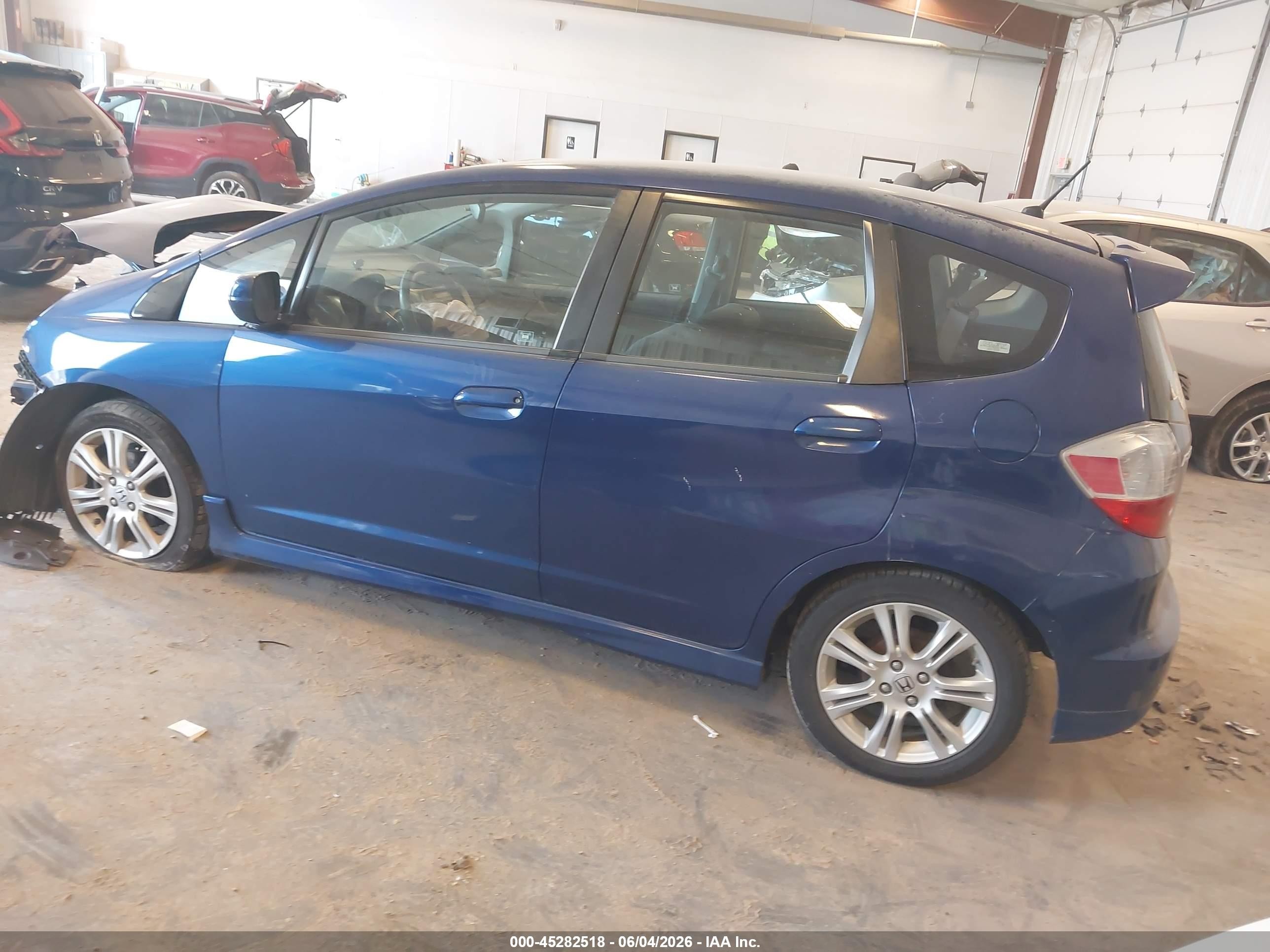 2009 Honda Fit Sport Blue vin: JHMGE88439S049053