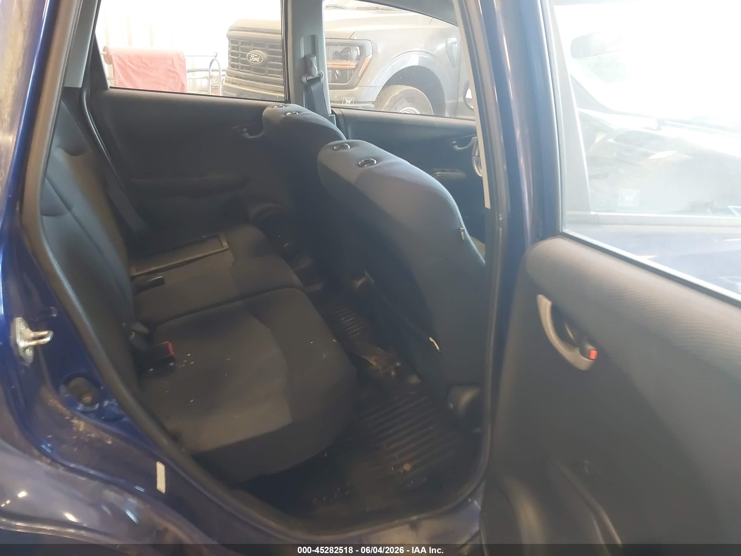 2009 Honda Fit Sport Blue vin: JHMGE88439S049053