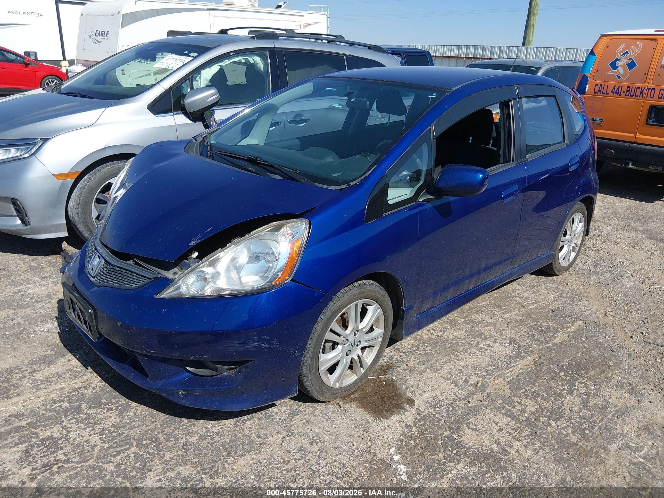 2009 Honda Fit Sport Blue vin: JHMGE88459S014661