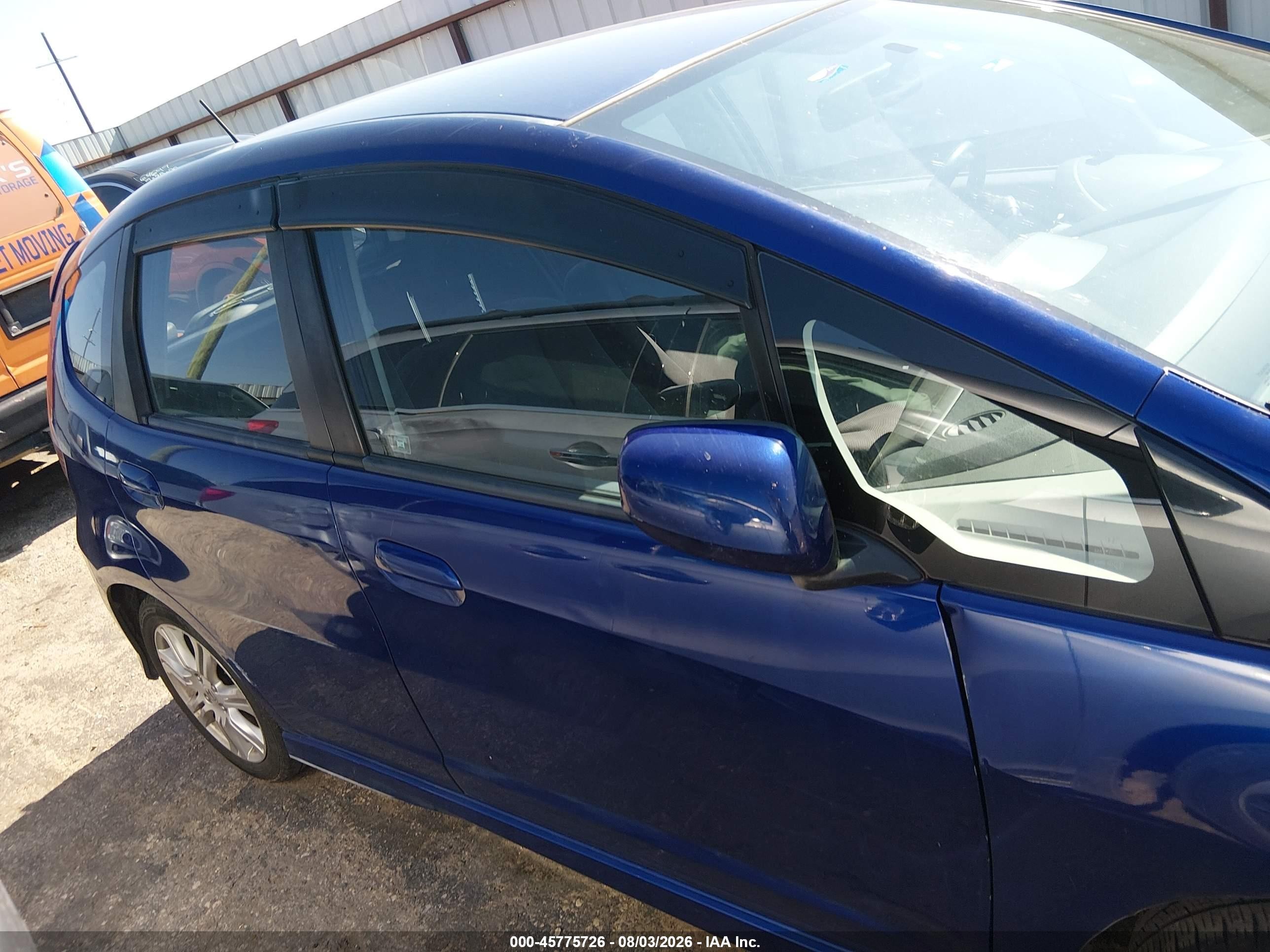 2009 Honda Fit Sport Blue vin: JHMGE88459S014661