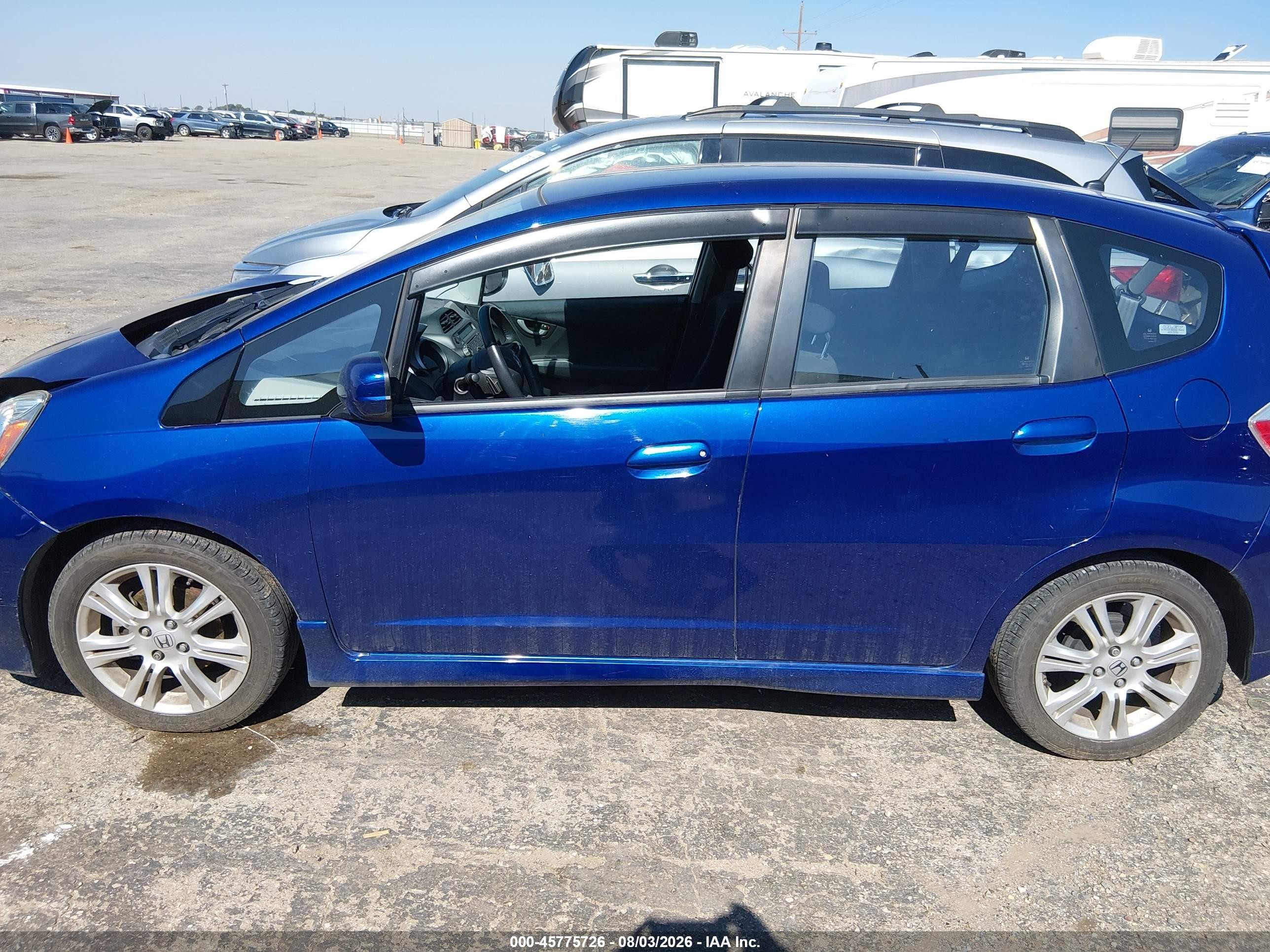 2009 Honda Fit Sport Blue vin: JHMGE88459S014661