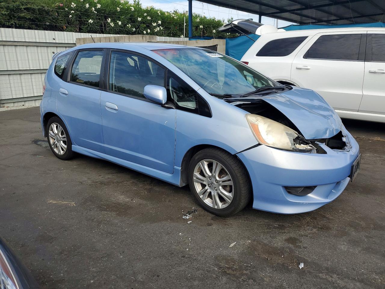 2009 Honda Fit Sport Blue vin: JHMGE88459S017222