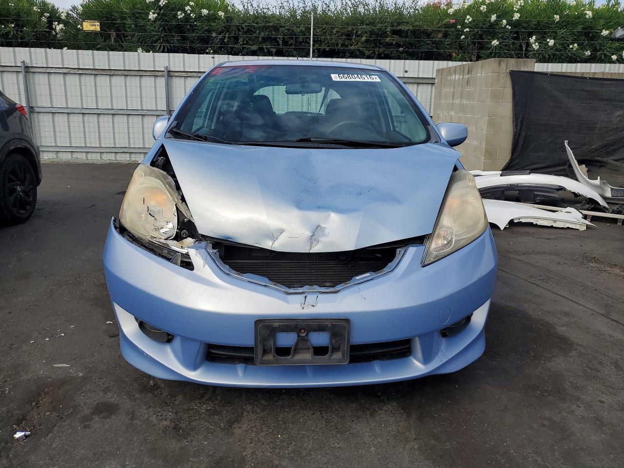 2009 Honda Fit Sport Blue vin: JHMGE88459S017222